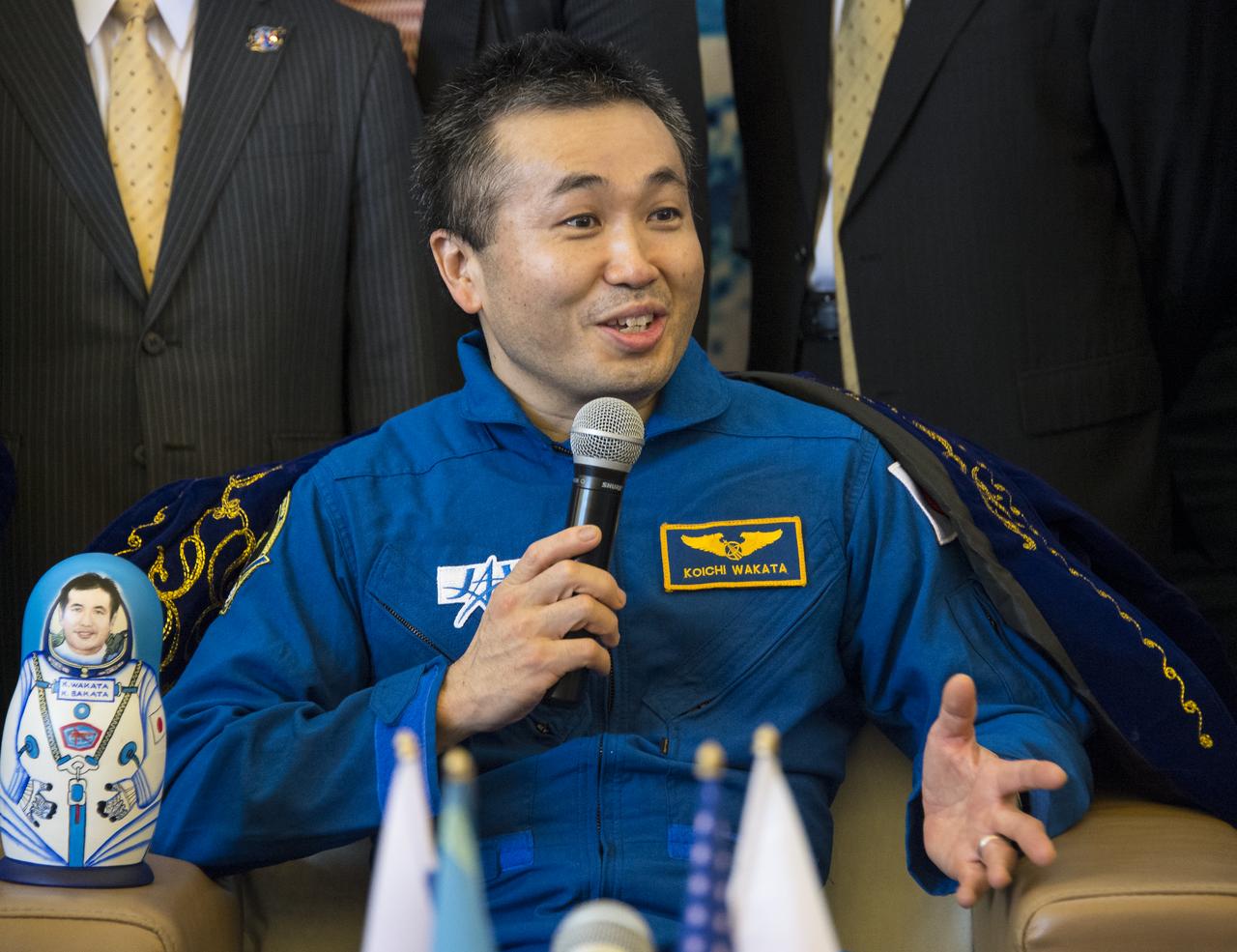 Expedition 39 Commander Koichi Wakata of the Japan Aerospace Exploration Agency (JAXA) answers questions from the media during a welcome home ceremony, Wednesday, May 14, 2014 at the Karaganda Airport in Kazakhstan. Wakata, Expedition 39 Soyuz Commander Mikhail Tyurin of Roscosmos, and Flight Engineer Rick Mastracchio of NASA landed in their Soyuz TMA-11M spacecraft just a few hours earlier near the town of Zhezkazgan. Wakata, Tyurin and Mastracchio returned to Earth after more than six months onboard the International Space Station where they served as members of the Expedition 38 and 39 crews. Photo Credit: (NASA/Bill Ingalls)