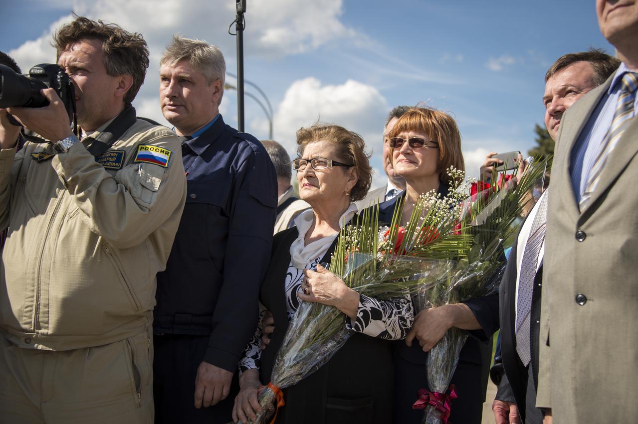 Family, friends, and government officials wait to welcome home Expedition 39 Soyuz Commander Mikhail Tyurin of Roscosmos at the Chkalovsky airport outside Star City, Russia, Wednesday, May 14, 2014. Tyurin, Expedition 39 Commander Koichi Wakata of the Japan Aerospace Exploration Agency (JAXA), and Flight Engineer Rick Mastracchio of NASA landed in their Soyuz TMA-11M spacecraft earlier in the day near the town of Zhezkazgan, Kazakhstan. Wakata, Tyurin and Mastracchio returned to Earth after more than six months onboard the International Space Station where they served as members of the Expedition 38 and 39 crews. Photo Credit: (NASA/Bill Ingalls)