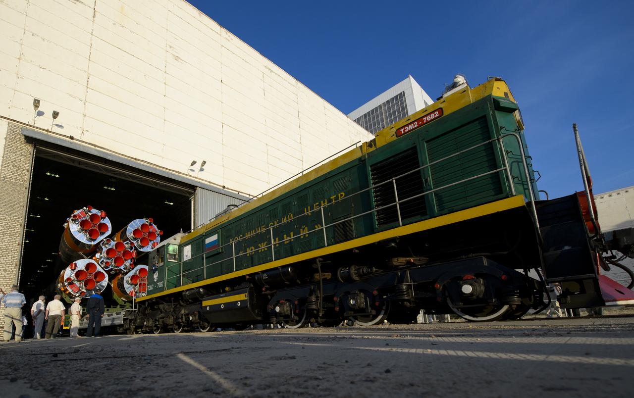 The Soyuz TMA-13M spacecraft is rolled out to the launch pad by train on Monday, May 26, 2014, at the Baikonur Cosmodrome in Kazakhstan.  Launch of the Soyuz rocket is scheduled for May 29 and will send Expedition 40 Soyuz Commander Maxim Suraev, of the Russian Federal Space Agency, Roscosmos, Flight Engineer Alexander Gerst, of the European Space Agency, ESA, and Flight Engineer Reid Wiseman of NASA on a five and a half month mission aboard the International Space Station.  Photo Credit: (NASA/Joel Kowsky)