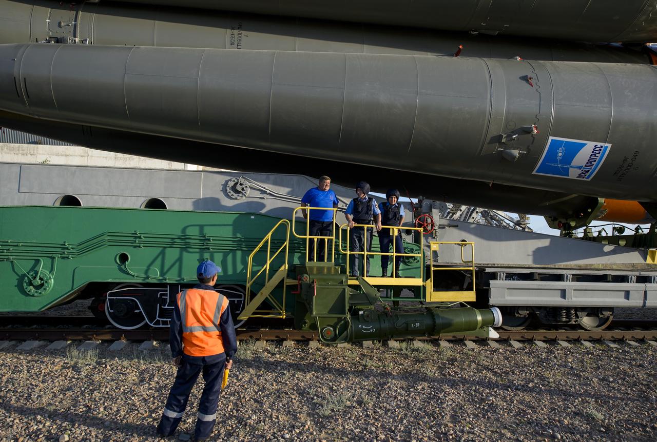 The Soyuz TMA-13M spacecraft is rolled out to the launch pad by train on Monday, May 26, 2014, at the Baikonur Cosmodrome in Kazakhstan.  Launch of the Soyuz rocket is scheduled for May 29 and will send Expedition 40 Soyuz Commander Maxim Suraev, of the Russian Federal Space Agency, Roscosmos, Flight Engineer Alexander Gerst, of the European Space Agency, ESA, and Flight Engineer Reid Wiseman of NASA on a five and a half month mission aboard the International Space Station.  Photo Credit: (NASA/Joel Kowsky)