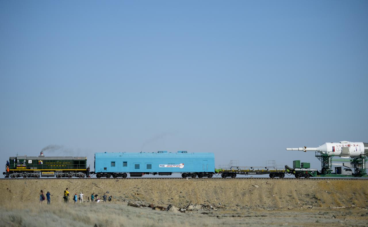 The Soyuz TMA-13M spacecraft is rolled out to the launch pad by train on Monday, May 26, 2014, at the Baikonur Cosmodrome in Kazakhstan.  Launch of the Soyuz rocket is scheduled for May 29 and will send Expedition 40 Soyuz Commander Maxim Suraev, of the Russian Federal Space Agency, Roscosmos, Flight Engineer Alexander Gerst, of the European Space Agency, ESA, and Flight Engineer Reid Wiseman of NASA on a five and a half month mission aboard the International Space Station.  Photo Credit: (NASA/Joel Kowsky)