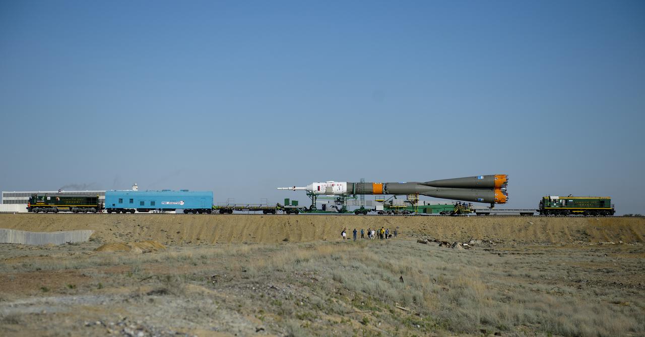 The Soyuz TMA-13M spacecraft is rolled out to the launch pad by train on Monday, May 26, 2014, at the Baikonur Cosmodrome in Kazakhstan.  Launch of the Soyuz rocket is scheduled for May 29 and will send Expedition 40 Soyuz Commander Maxim Suraev, of the Russian Federal Space Agency, Roscosmos, Flight Engineer Alexander Gerst, of the European Space Agency, ESA, and Flight Engineer Reid Wiseman of NASA on a five and a half month mission aboard the International Space Station.  Photo Credit: (NASA/Joel Kowsky)