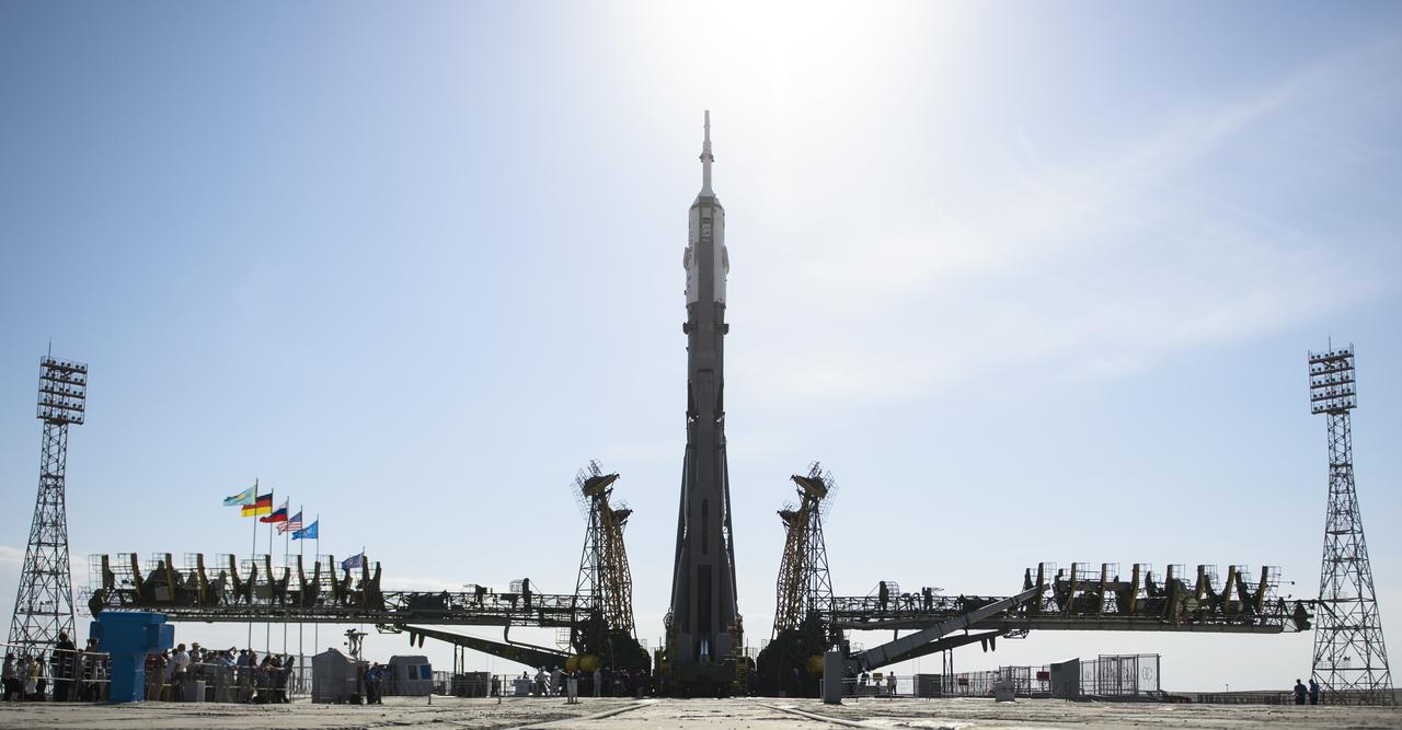 The Soyuz TMA-13M spacecraft is seen shortly after being raised into a vertical position on the launch pad on Monday, May 26, 2014, at the Baikonur Cosmodrome in Kazakhstan.  Launch of the Soyuz rocket is scheduled for May 29 and will send Expedition 40 Soyuz Commander Maxim Suraev, of the Russian Federal Space Agency, Roscosmos, Flight Engineer Alexander Gerst, of the European Space Agency, ESA, and Flight Engineer Reid Wiseman of NASA on a five and a half month mission aboard the International Space Station.  Photo Credit: (NASA/Joel Kowsky)