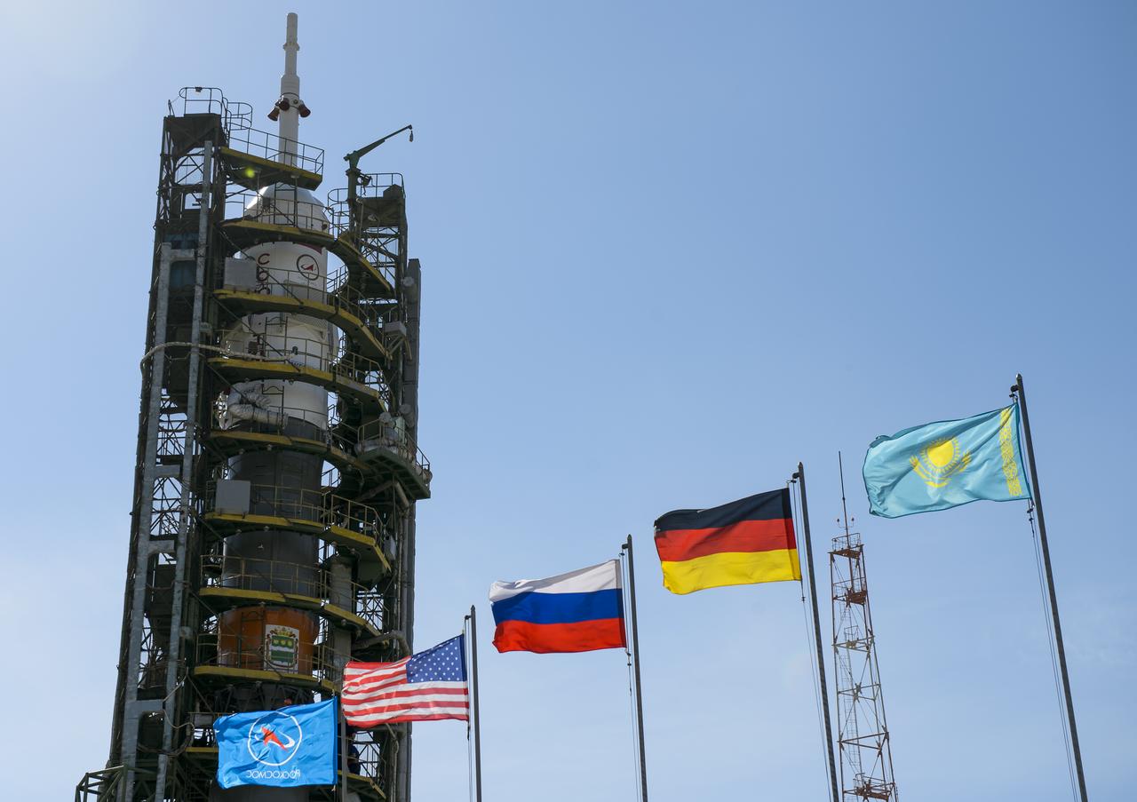 The Soyuz TMA-13M rocket is seen after the service structure arms were raised into position at the launch pad on Monday, May 26, 2014, at the Baikonur Cosmodrome in Kazakhstan.  Launch of the Soyuz rocket is scheduled for May 29 and will send Expedition 40 Soyuz Commander Maxim Suraev, of the Russian Federal Space Agency, Roscosmos, Flight Engineer Alexander Gerst, of the European Space Agency, ESA, and Flight Engineer Reid Wiseman of NASA on a five and a half month mission aboard the International Space Station.  Photo Credit: (NASA/Joel Kowsky)