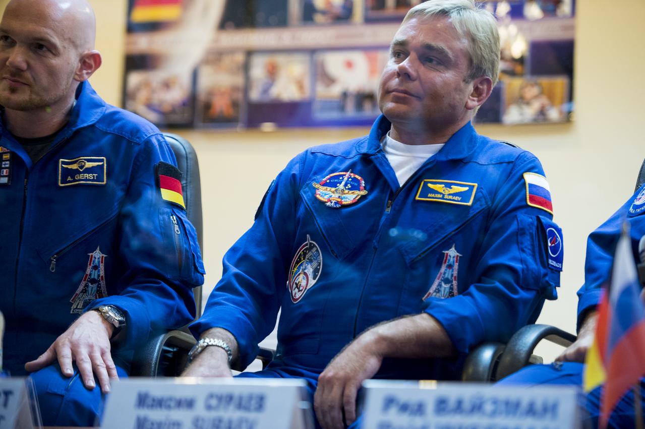 Expedition 40 Soyuz Commander Maxim Suraev of the Russian Federal Space Agency, Roscosmos, as seen during a press conference, Tuesday, May 27, 2014, at the Cosmonaut Hotel in Baikonur, Kazakhstan. Expedition 40 Soyuz Commander Maxim Suraev of the Russian Federal Space Agency, Roscosmos, Flight Engineer Alexander Gerst of the European Space Agency, ESA, and Flight Engineer Reid Wiseman of NASA will launch aboard their Soyuz TMA-13M spacecraft on their mission to the International Space Station in the early hours of May 29. Photo Credit: (NASA/Joel Kowsky)
