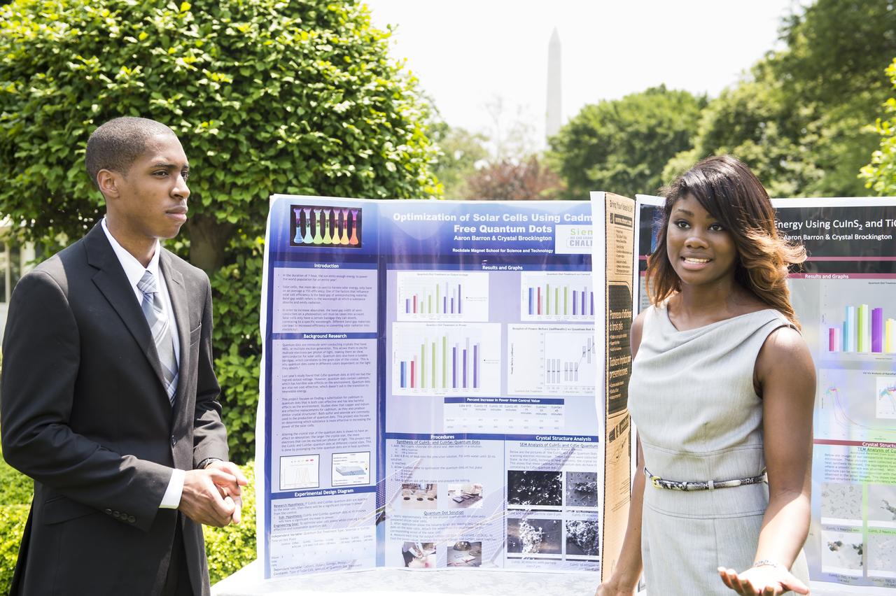 Crystal Brockington and Aaron Barron, both 18 years old, designed a more efficient and cost effective solar cell that harnesses energy without cadmium, which has been shown to be harmful to the environment. They were selected to participate in the White House Science Fair after they were awarded the High School Grand Prize at the Siemens We Can Change the World Challenge. The fourth White House Science Fair was held at the White House on May 27, 2014 and included 100 students from more than 30 different states who competed in science, technology, engineering, and math (STEM) competitions. (Photo Credit: NASA/Aubrey Gemignani)