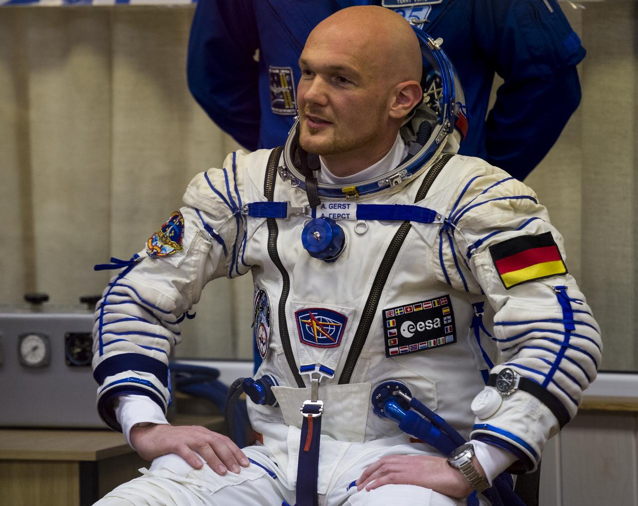 Expedition 40 Flight Engineer Alexander Gerst of the European Space Agency, ESA, is seen before his Russian Sokol suit is pressure checked in preparation for his launch onboard the Soyuz TMA-13M spacecraft on Wednesday, May 28, 2014 at the Baikonur Cosmodrome in Kazakhstan. The Soyuz spacecraft with Gerst, Expedition 40 Soyuz Commander Maxim Suraev of the Russian Federal Space Agency, Roscosmos, and Flight Engineer Reid Wiseman of NASA is scheduled to launch at 1:57 a.m. Kazakhstan time on Thursday, May 29. Photo Credit: (NASA/Joel Kowsky)
