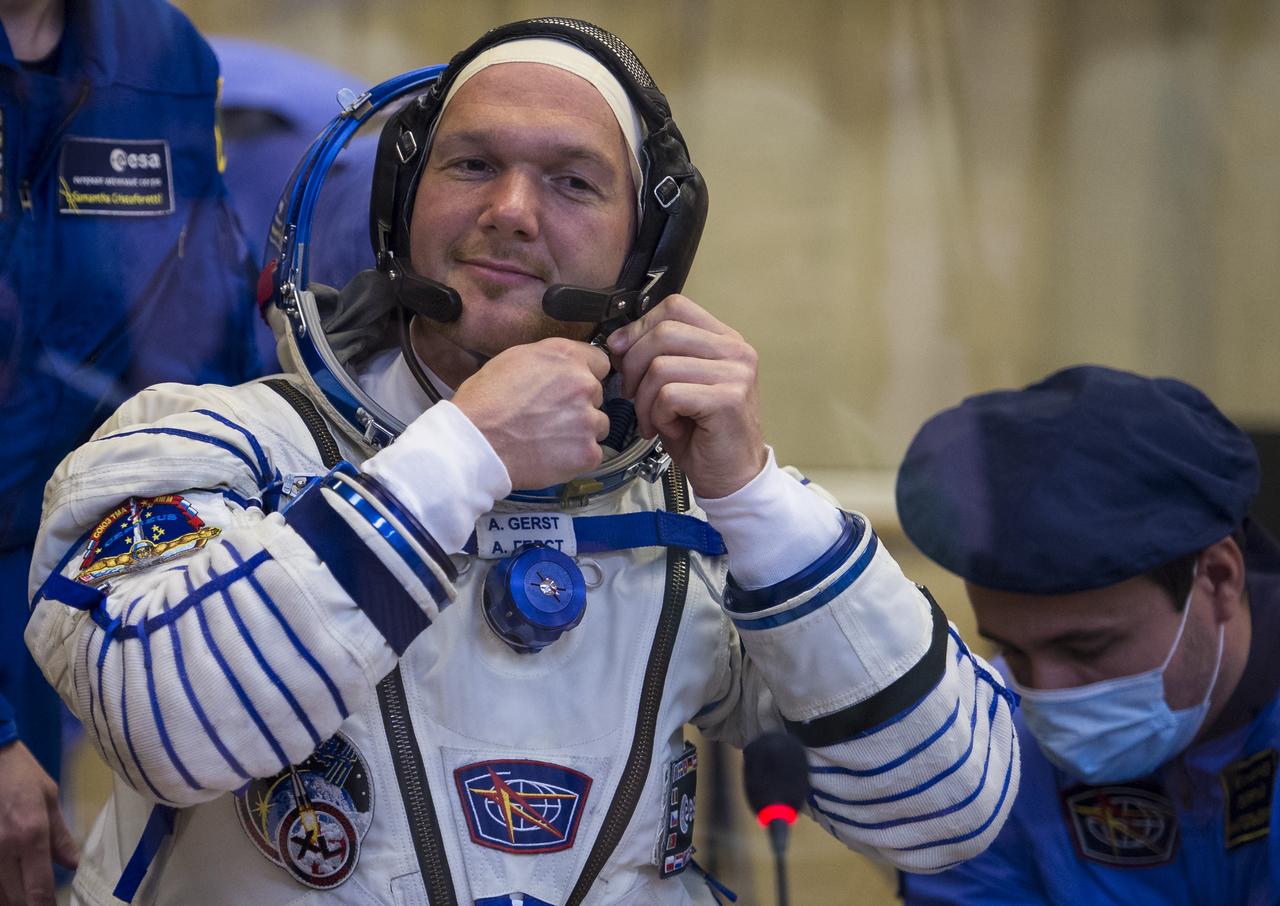 Expedition 40 Flight Engineer Alexander Gerst of the European Space Agency, ESA, is seen after having his Russian Sokol suit pressure checked in preparation for his launch onboard the Soyuz TMA-13M spacecraft on Wednesday, May 28, 2014 at the Baikonur Cosmodrome in Kazakhstan. The Soyuz spacecraft with Gerst, Expedition 40 Soyuz Commander Maxim Suraev of the Russian Federal Space Agency, Roscosmos, and Flight Engineer Reid Wiseman of NASA is scheduled to launch at 1:57 a.m. Kazakhstan time on Thursday, May 29. Photo Credit: (NASA/Joel Kowsky)