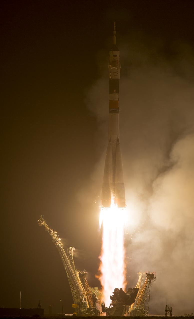 The Soyuz TMA-13M rocket is launched with Expedition 40 Soyuz Commander Maxim Suraev, of the Russian Federal Space Agency, Roscosmos, Flight Engineer Alexander Gerst, of the European Space Agency, ESA, and Flight Engineer Reid Wiseman of NASA, Thursday, May 29, 2014 at the Baikonur Cosmodrome in Kazakhstan. Suraev, Gerst, and Wiseman will spend the next five and a half months aboard the International Space Station. Photo Credit: (NASA/Joel Kowsky)