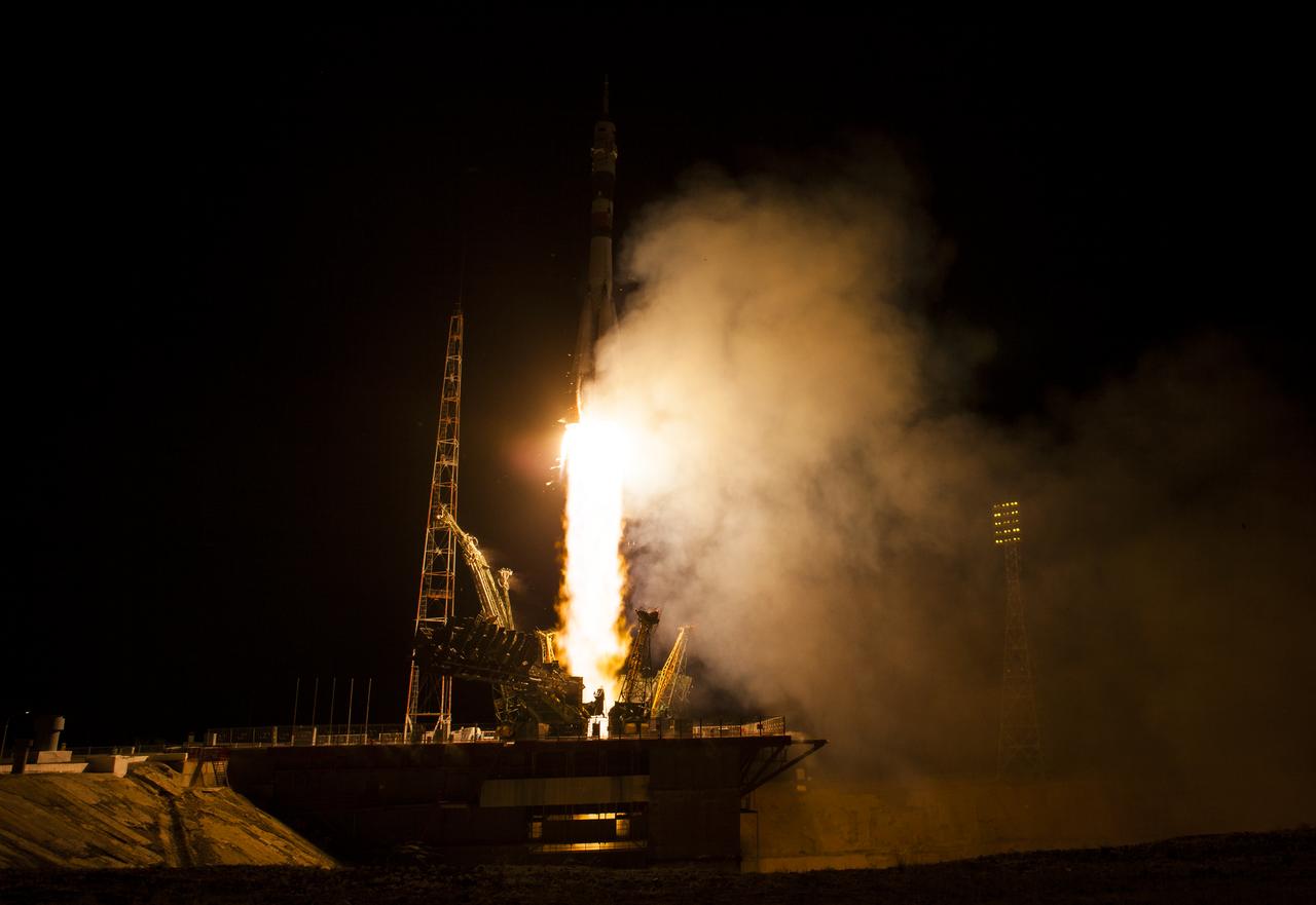 The Soyuz TMA-13M rocket is launched with Expedition 40 Soyuz Commander Maxim Suraev, of the Russian Federal Space Agency, Roscosmos, Flight Engineer Alexander Gerst, of the European Space Agency, ESA, and Flight Engineer Reid Wiseman of NASA, Thursday, May 29, 2014 at the Baikonur Cosmodrome in Kazakhstan. Suraev, Gerst, and Wiseman will spend the next five and a half months aboard the International Space Station. Photo Credit: (NASA/Joel Kowsky)