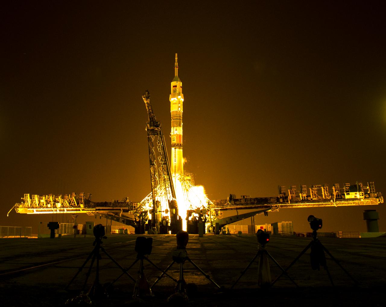 The Soyuz TMA-13M rocket is launched with Expedition 40 Soyuz Commander Maxim Suraev, of the Russian Federal Space Agency, Roscosmos, Flight Engineer Alexander Gerst, of the European Space Agency, ESA, and Flight Engineer Reid Wiseman of NASA, Thursday, May 29, 2014 at the Baikonur Cosmodrome in Kazakhstan. Suraev, Gerst, and Wiseman will spend the next five and a half months aboard the International Space Station. Photo Credit: (NASA/Joel Kowsky)