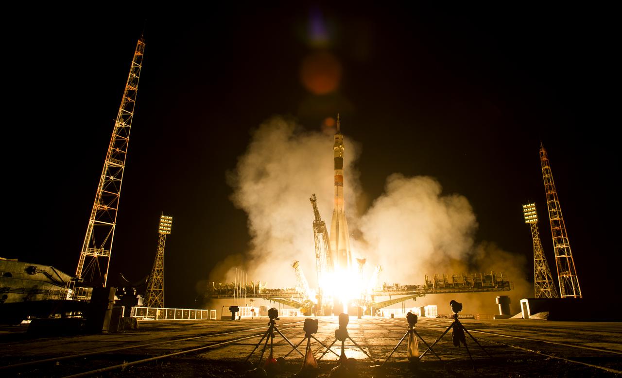 The Soyuz TMA-13M rocket is launched with Expedition 40 Soyuz Commander Maxim Suraev, of the Russian Federal Space Agency, Roscosmos, Flight Engineer Alexander Gerst, of the European Space Agency, ESA, and Flight Engineer Reid Wiseman of NASA, Thursday, May 29, 2014 at the Baikonur Cosmodrome in Kazakhstan. Suraev, Gerst, and Wiseman will spend the next five and a half months aboard the International Space Station. Photo Credit: (NASA/Joel Kowsky)