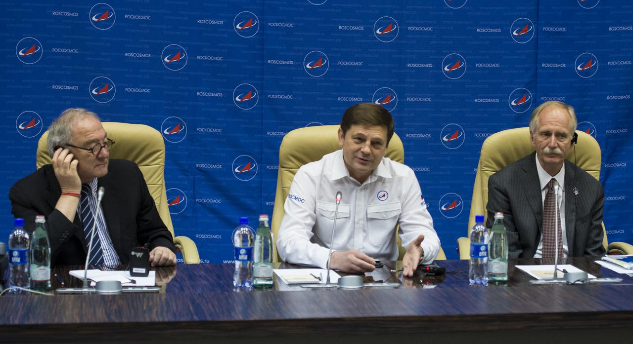 Jean-Jacques Dordain, Director General of the European Space Agency, left, Oleg Ostapenko, General Director of the Russian Federal Space Agency, Roscosmos, center, and William Gerstenmaier, NASA Associate Administrator for Human Exploration and Operations, right, are seen during a joint statement after the docking of the Soyuz TMA-13M spacecraft with the International Space Station on Thursday, May 29, 2014 at the Baikonur Hotel in Baikonur, Kazakhstan.  Photo Credit: (NASA/Joel Kowsky)