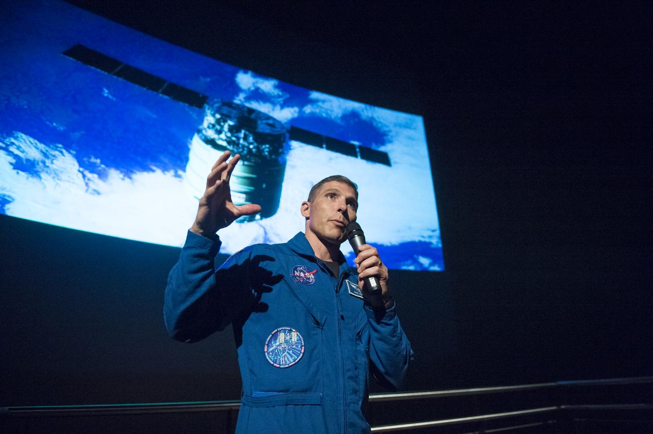 NASA Astronaut Mike Hopkins explains what it was like to live on the International Space Station for 6 months to seventh graders from Clear Spring Middle School at the Maryland Science Center in Baltimore, MD on Monday, June 9, 2014. Hopkins served on Expeditions 37 and 38 with Russian cosmonauts Oleg Kotov and Sergey Ryazanskiy and returned home in March, 2014.  (Photo Credit: NASA/Aubrey Gemignani)