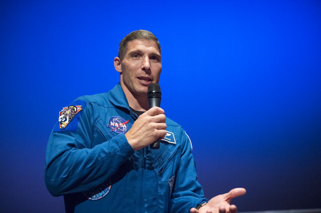 NASA Astronaut Mike Hopkins explains what it was like to live on the International Space Station for 6 months to seventh graders from Clear Spring Middle School at the Maryland Science Center in Baltimore, MD on Monday, June 9, 2014. Hopkins served on Expeditions 37 and 38 with Russian cosmonauts Oleg Kotov and Sergey Ryazanskiy and returned home in March, 2014.  (Photo Credit: NASA/Aubrey Gemignani)