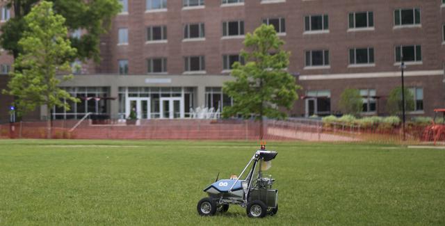 A team KuuKulgur Robot from Estonia is seen on the practice field during the 2014 NASA Centennial Challenges Sample Return Robot Challenge, Tuesday, June 10, 2014, at the Worcester Polytechnic Institute (WPI) in Worcester, Mass.   Team KuuKulgur is one of eighteen teams competing for a $1.5 million NASA prize purse. Teams will be required to demonstrate autonomous robots that can locate and collect samples from a wide and varied terrain, operating without human control. The objective of this NASA-WPI Centennial Challenge is to encourage innovations in autonomous navigation and robotics technologies. Innovations stemming from the challenge may improve NASA's capability to explore a variety of destinations in space, as well as enhance the nation's robotic technology for use in industries and applications on Earth. Photo Credit: (NASA/Joel Kowsky)