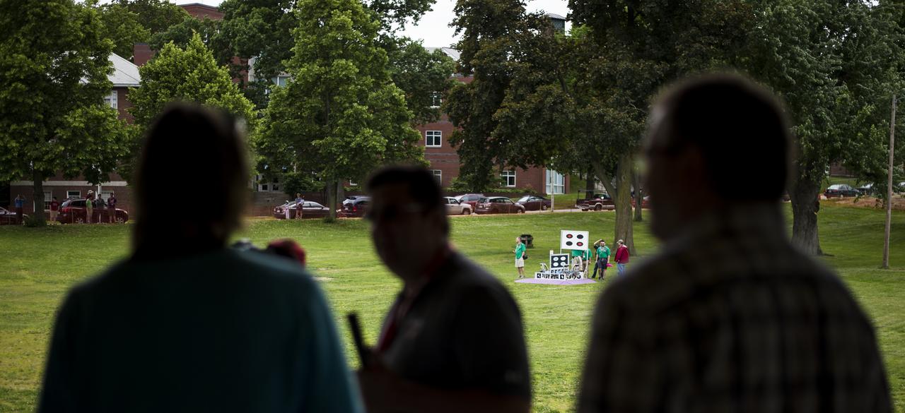 Team KuuKulgur waits to begin the level one challenge during the 2014 NASA Centennial Challenges Sample Return Robot Challenge, Wednesday, June 11, 2014, at the Worcester Polytechnic Institute (WPI) in Worcester, Mass.   Eighteen teams are competing for a $1.5 million NASA prize purse. Teams will be required to demonstrate autonomous robots that can locate and collect samples from a wide and varied terrain, operating without human control. The objective of this NASA-WPI Centennial Challenge is to encourage innovations in autonomous navigation and robotics technologies. Innovations stemming from the challenge may improve NASA's capability to explore a variety of destinations in space, as well as enhance the nation's robotic technology for use in industries and applications on Earth. Photo Credit: (NASA/Joel Kowsky)during the 2014 NASA Centennial Challenges Sample Return Robot Challenge, Wednesday, June 11, 2014, at the Worcester Polytechnic Institute (WPI) in Worcester, Mass.   Eighteen teams are competing for a $1.5 million NASA prize purse. Teams will be required to demonstrate autonomous robots that can locate and collect samples from a wide and varied terrain, operating without human control. The objective of this NASA-WPI Centennial Challenge is to encourage innovations in autonomous navigation and robotics technologies. Innovations stemming from the challenge may improve NASA's capability to explore a variety of destinations in space, as well as enhance the nation's robotic technology for use in industries and applications on Earth. Photo Credit: (NASA/Joel Kowsky)