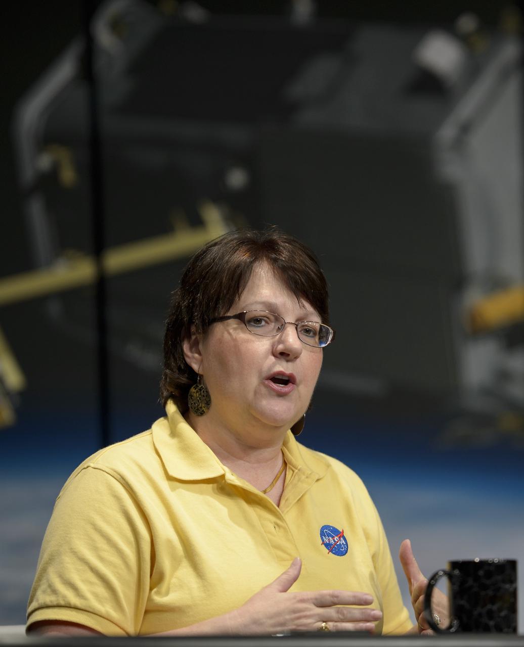 Betsy Edwards, OCO-2 program executive with the Science Mission Directorate at NASA Headquarters in Washington discusses the Orbiting Carbon Observatory-2 (OCO-2), NASA’s first spacecraft dedicated to studying carbon dioxide, during a press briefing, Thursday, June 12, 2014, at NASA Headquarters in Washington. OCO-2 is set for a July 1, 2014 launch from Vandenberg Air Force Base in California. Its mission is to measure the global distribution of carbon dioxide, the leading human-produced greenhouse gas driving changes in Earth’s climate.  Photo Credit: (NASA/Bill Ingalls)