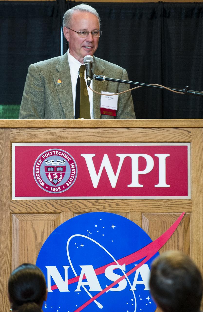 David Miller, NASA Chief Technologist, speaks at a breakfast opening the TouchTomorrow Festival, held in conjunction with the 2014 NASA Centennial Challenges Sample Return Robot Challenge, Saturday, June 14, 2014, at the Worcester Polytechnic Institute (WPI) in Worcester, Mass.   Eighteen teams are competing for a $1.5 million NASA prize purse. Teams will be required to demonstrate autonomous robots that can locate and collect samples from a wide and varied terrain, operating without human control. The objective of this NASA-WPI Centennial Challenge is to encourage innovations in autonomous navigation and robotics technologies. Innovations stemming from the challenge may improve NASA's capability to explore a variety of destinations in space, as well as enhance the nation's robotic technology for use in industries and applications on Earth. Photo Credit: (NASA/Joel Kowsky)