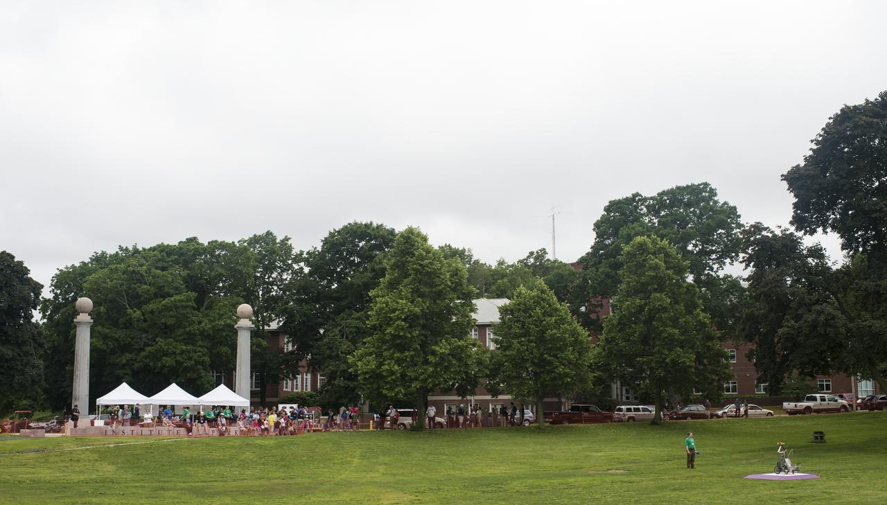 Team Cephal's robot is seen on the starting platform during a rerun of the level one challenge at the 2014 NASA Centennial Challenges Sample Return Robot Challenge, Saturday, June 14, 2014, at the Worcester Polytechnic Institute (WPI) in Worcester, Mass.   Eighteen teams are competing for a $1.5 million NASA prize purse. Teams will be required to demonstrate autonomous robots that can locate and collect samples from a wide and varied terrain, operating without human control. The objective of this NASA-WPI Centennial Challenge is to encourage innovations in autonomous navigation and robotics technologies. Innovations stemming from the challenge may improve NASA's capability to explore a variety of destinations in space, as well as enhance the nation's robotic technology for use in industries and applications on Earth. Photo Credit: (NASA/Joel Kowsky)