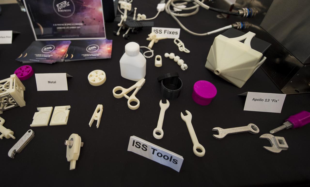 The Made In Space company displays some of the tools that can be made by their 3D printer during the first ever White House Maker Faire which brings together students, entrepreneurs, and everyday citizens who are using new tools and techniques to launch new businesses, learn vital skills in science, technology, engineering, and math (STEM), and fuel the renaissance in American manufacturing, at the White House, Wednesday, June 18, 2014 in Washington. The Made In Space 3D printer was just approved by NASA to be tested onboard the International Space Station (ISS), and NASA announced a challenge for students to design items that would be printed by this first 3D printer to fly in space.  Photo Credit: (NASA/Bill Ingalls)