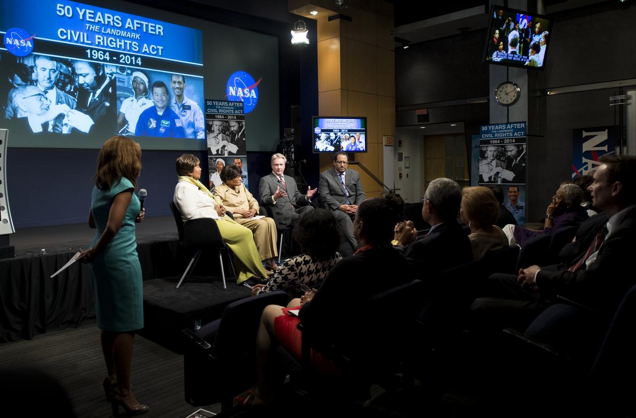 Dr. Roger Launius, Associate Director of Collections and Curatorial Affairs at the Smithsonian National Air and Space Museum, second from right, speaks as part of a panel discussion at an event celebrating the 50th Anniversary of the Civil Rights Act of 1964 on Monday, June 23, 2014 in the James E. Webb Auditorium at NASA Headquarters in Washington, DC. The event highlighted the influence of the Civil Rights Act on NASA. Photo Credit: (NASA/Joel Kowsky)