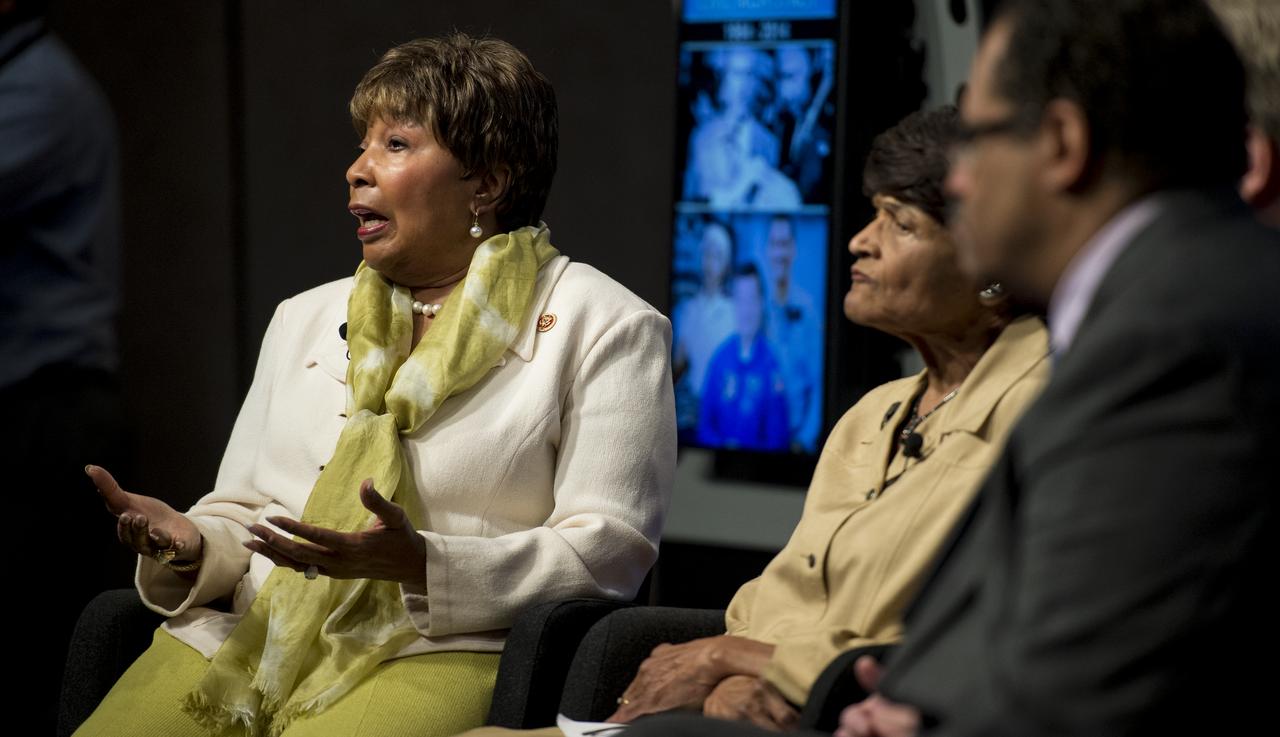 U.S. Representative Eddie Bernice Johnson, of Texas, left; answers a question from the audience during a panel discussion at an event celebrating the 50th Anniversary of the Civil Rights Act of 1964 on Monday, June 23, 2014 in the James E. Webb Auditorium at NASA Headquarters in Washington, DC.  The event highlighted the influence of the Civil Rights Act on NASA. Photo Credit: (NASA/Joel Kowsky)