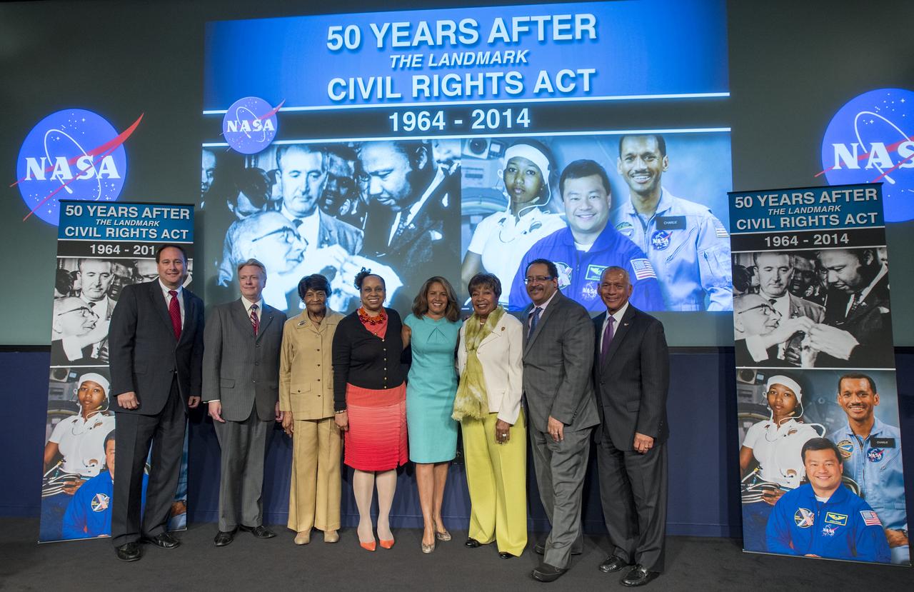 From left: Robert Lightroot. NASA Associate Administrator; Dr. Roger Launius, Associate Director of Collections and Curatorial Affairs at the Smithsonian National Air and Space Museum; Dr. Harriett Jenkins, Former Assistant Administrator for Equal Opportunity Programs at NASA; Brenda Manuel, Associate Administrator for Diversity and Equal Opportunity at NASA; Suzanne Malveaux, CNN Correspondent and panel moderator; U.S. Representative Eddie Bernice Johnson, of Texas; Dr. Michael Eric Dyson, professor of sociology at Georgetown University; and Charles Bolden, NASA Administrator; pose for a picture following an event celebrating the 50th Anniversary of the Civil Rights Act of 1964 on Monday, June 23, 2014 in the James E. Webb Auditorium at NASA Headquarters in Washington, DC.  The event highlighted the influence of the Civil Rights Act on NASA. Photo Credit: (NASA/Joel Kowsky)