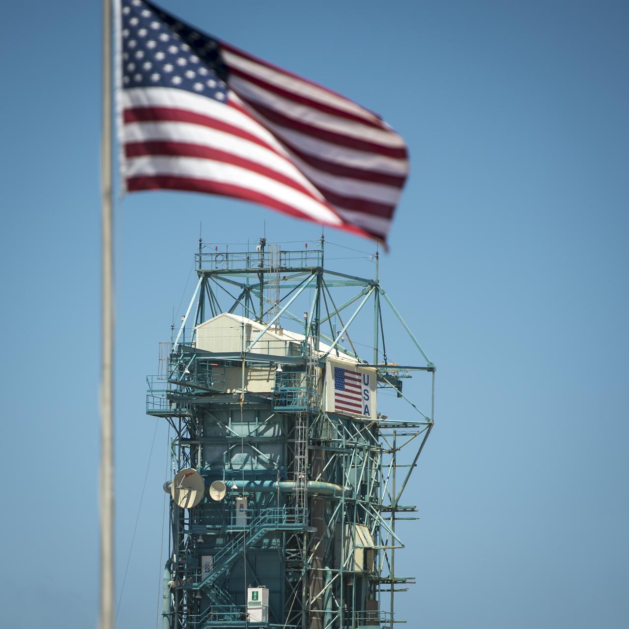The upper levels of the launch gantry, surrounding the United Launch Alliance Delta II rocket with the Orbiting Carbon Observatory-2 (OCO-2) satellite onboard, are seen at the Space Launch Complex 2, Sunday, June 29, 2014, Vandenberg Air Force Base, Calif.  OCO-2 will measure the global distribution of carbon dioxide, the leading human-produced greenhouse gas driving changes in Earth’s climate.  OCO-2 is set for a July 1, 2014 launch. Photo Credit: (NASA/Bill Ingalls)