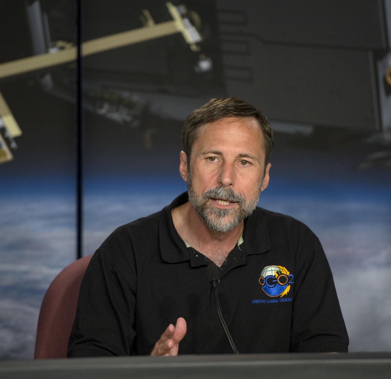 Dave Crisp, OCO-2 science team leader, JPL talks during an Orbiting Carbon Observatory-2 (OCO-2) science briefing, Sunday, June 29, 2014, Vandenberg Air Force Base, Calif. OCO-2 will measure the global distribution of carbon dioxide, the leading human-produced greenhouse gas driving changes in Earth’s climate. OCO-2 is set to launch on July 1, 2014 at 2:59 a.m. PDT. Photo Credit: (NASA/Bill Ingalls)