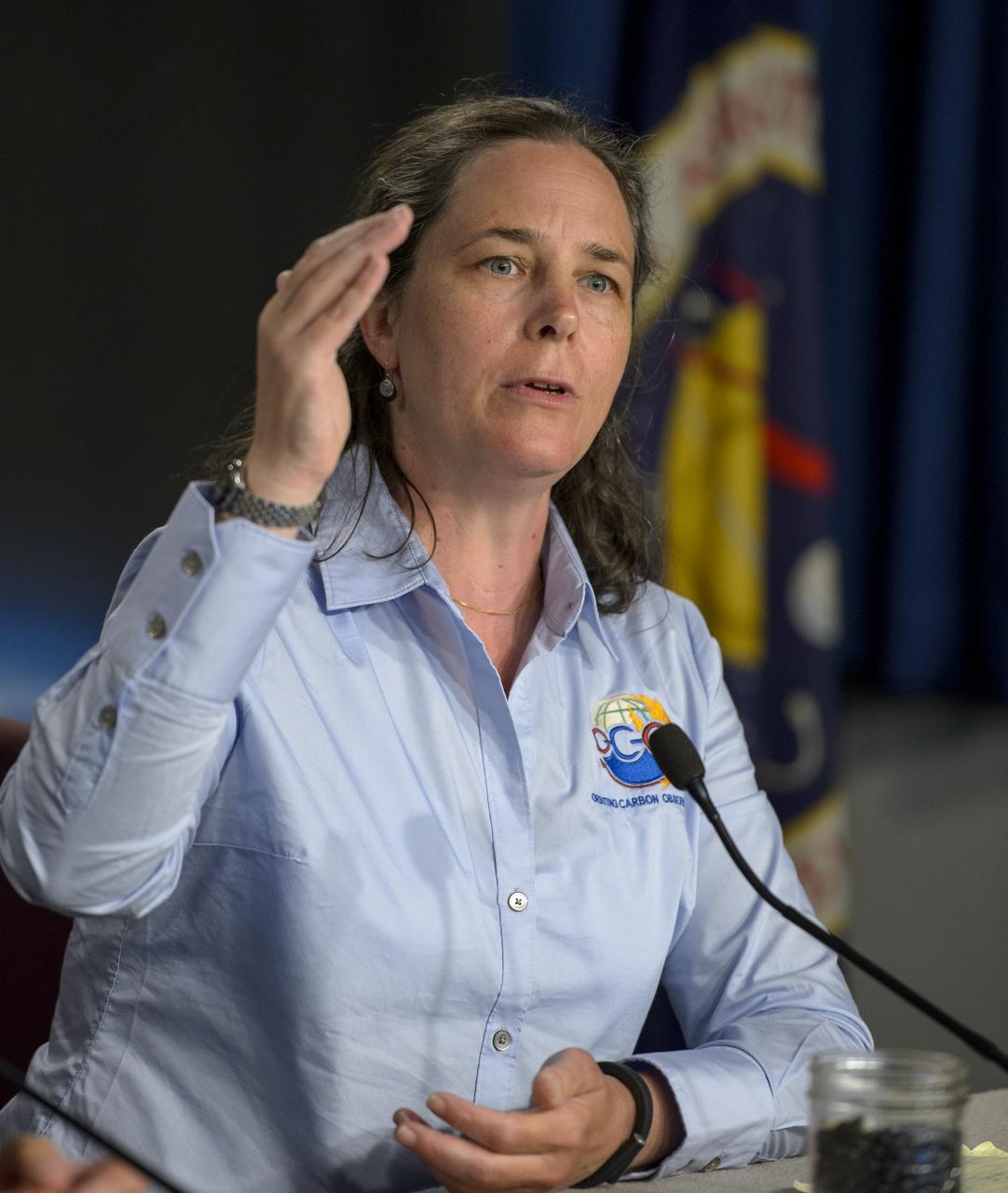 Annmarie Eldering, OCO-2 deputy project scientist, JPL talks during an Orbiting Carbon Observatory-2 (OCO-2) science briefing, Sunday, June 29, 2014, Vandenberg Air Force Base, Calif. OCO-2 will measure the global distribution of carbon dioxide, the leading human-produced greenhouse gas driving changes in Earth’s climate. OCO-2 is set to launch on July 1, 2014 at 2:59 a.m. PDT. Photo Credit: (NASA/Bill Ingalls)