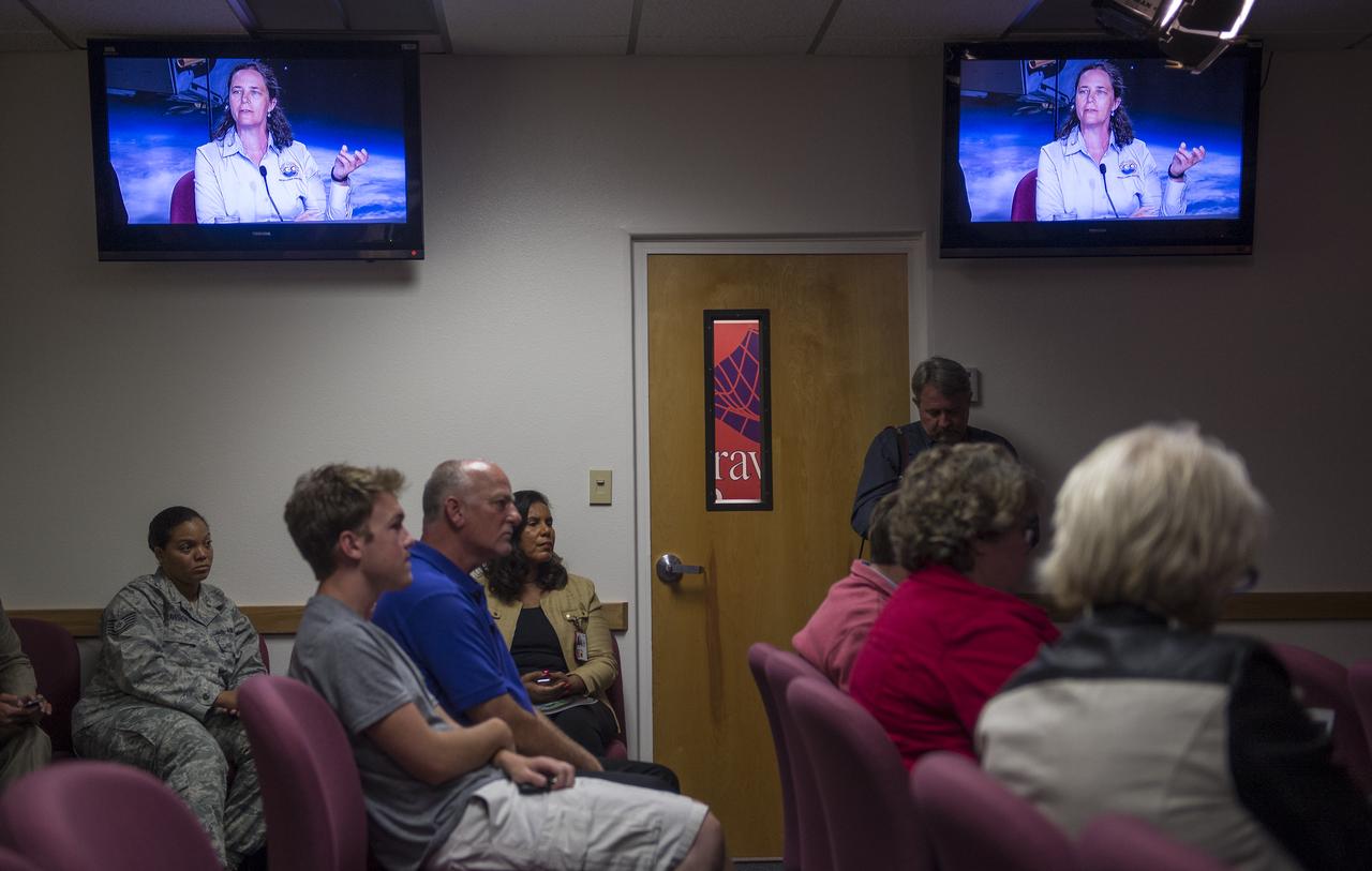 Annmarie Eldering, OCO-2 deputy project scientist, JPL is seen talking on the monitors during an Orbiting Carbon Observatory-2 (OCO-2) science briefing, Sunday, June 29, 2014, Vandenberg Air Force Base, Calif. OCO-2 will measure the global distribution of carbon dioxide, the leading human-produced greenhouse gas driving changes in Earth’s climate. OCO-2 is set to launch on July 1, 2014 at 2:59 a.m. PDT. Photo Credit: (NASA/Bill Ingalls)