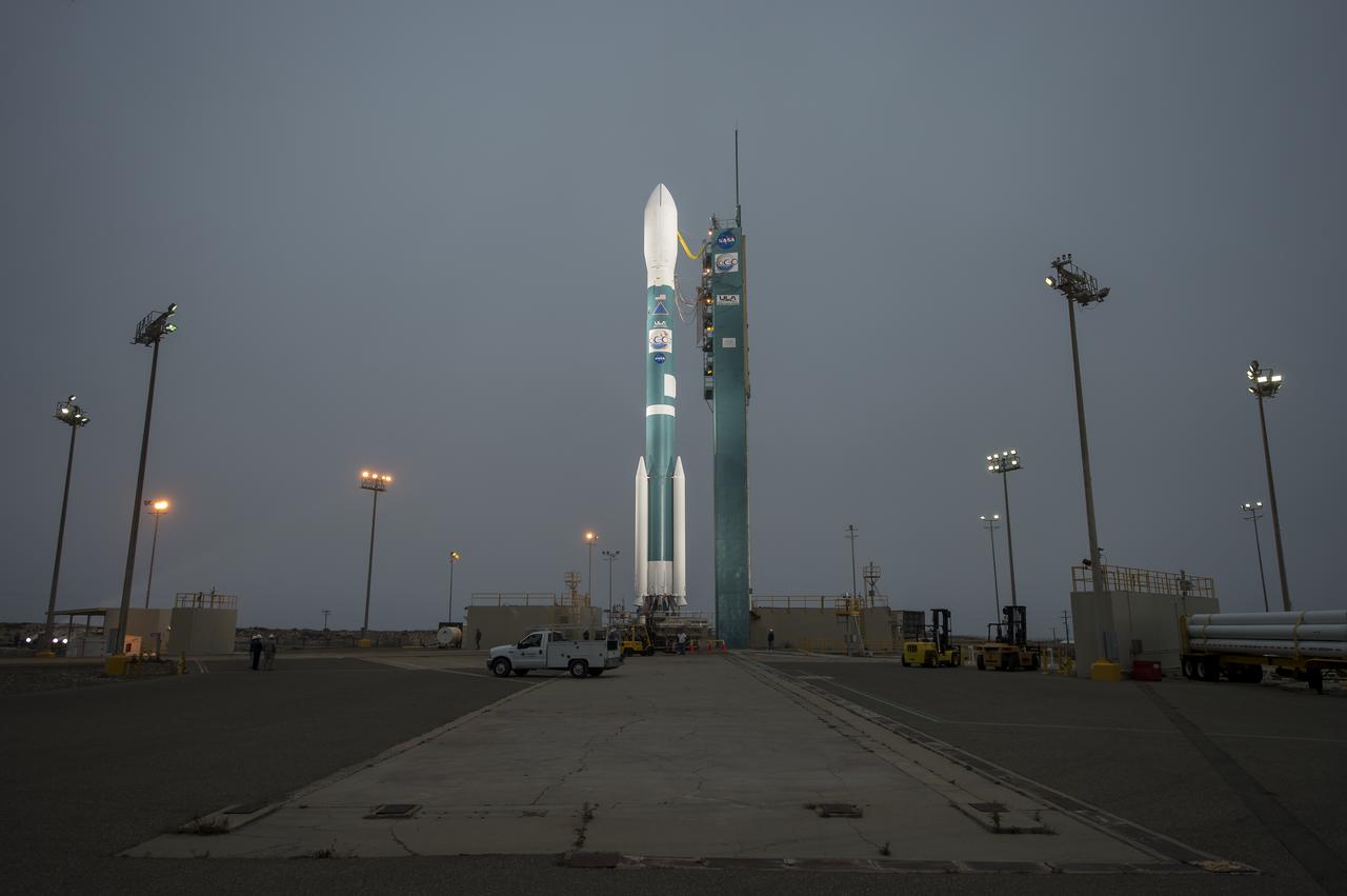The United Launch Alliance Delta II rocket with the Orbiting Carbon Observatory-2 (OCO-2) satellite onboard, is seen moments after the launch gantry was moved at the Space Launch Complex 2, Monday, June 30, 2014, Vandenberg Air Force Base, Calif. OCO-2 will measure the global distribution of carbon dioxide, the leading human-produced greenhouse gas driving changes in Earth’s climate. OCO-2 is set for a July 1, 2014 launch. Photo Credit: (NASA/Bill Ingalls)