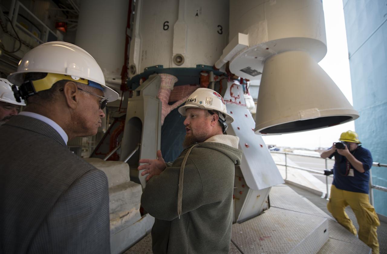 NASA Administrator Charles Bolden, left, talks with an engineer at the base of the United Launch Alliance Delta II rocket with the Orbiting Carbon Observatory-2 (OCO-2) satellite onboard, Monday, June 30, 2014, Space Launch Complex 2, Vandenberg Air Force Base, Calif.  OCO-2 will measure the global distribution of carbon dioxide, the leading human-produced greenhouse gas driving changes in Earth’s climate.  OCO-2 is set for a July 1, 2014 launch. Photo Credit: (NASA/Bill Ingalls)