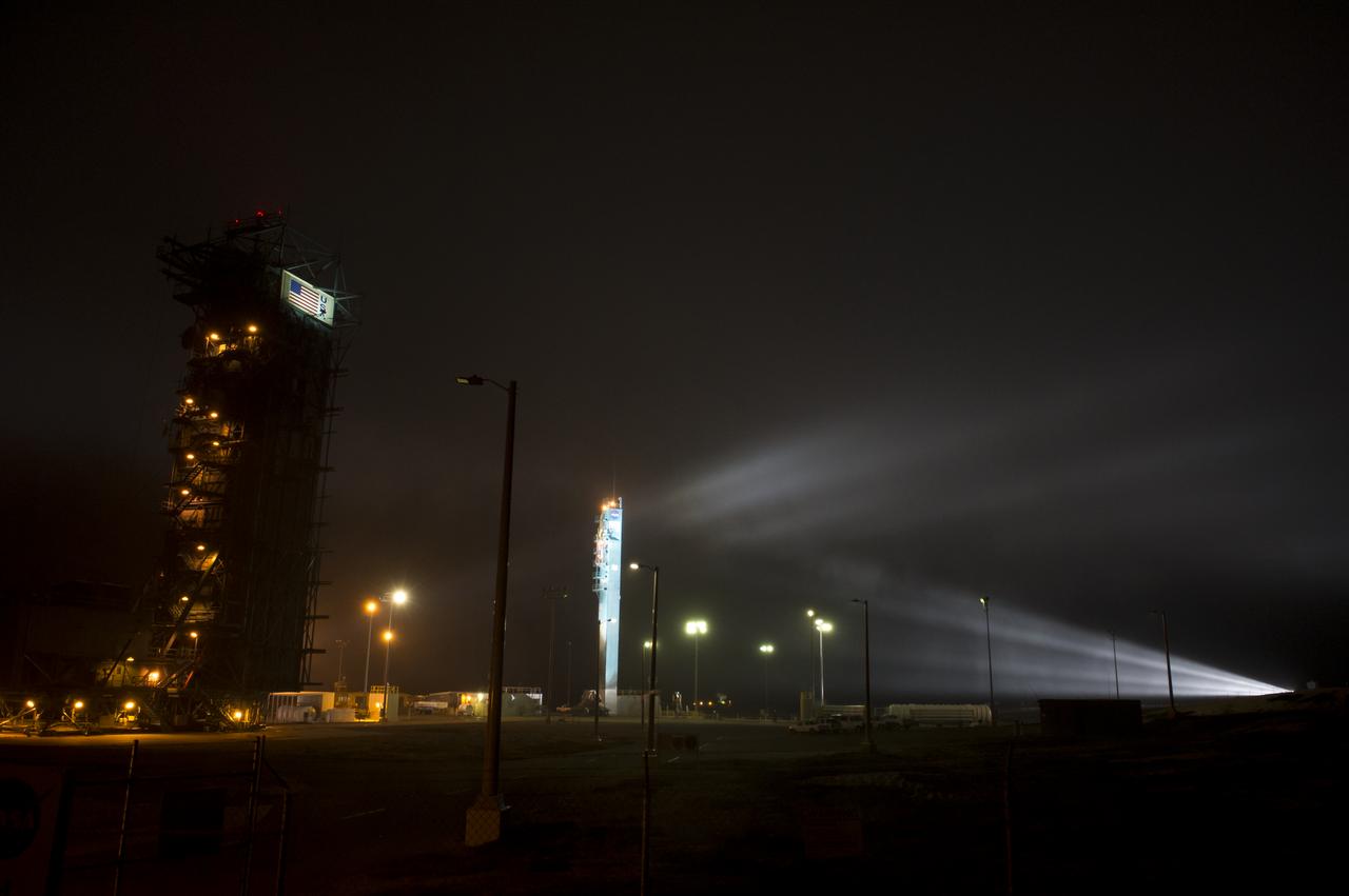 Lights shine on the umbilical tower shortly after a United Launch Alliance Delta II rocket launched with the Orbiting Carbon Observatory-2 (OCO-2)satellite onboard from Space Launch Complex 2 at Vandenberg Air Force Base, Calif. on Wednesday, July 2, 2014. OCO-2 will measure the global distribution of carbon dioxide, the leading human-produced greenhouse gas driving changes in Earth’s climate. Photo Credit: (NASA/Bill Ingalls)