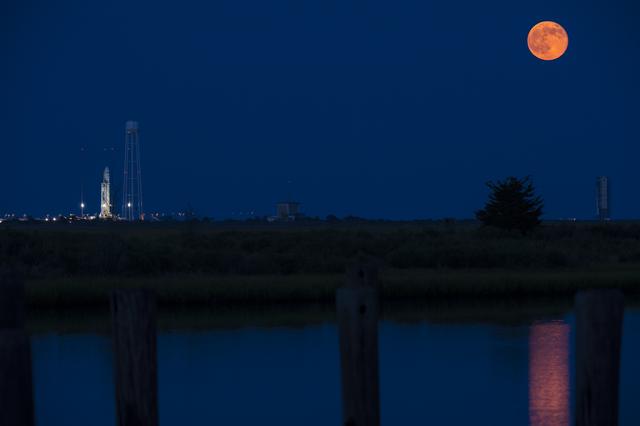NASA image: Antares Rocket with Full Moon