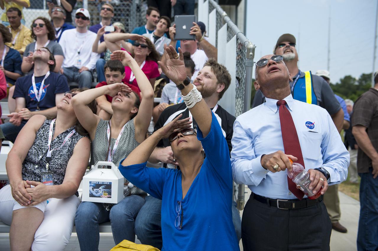 NASA Administrator Charles Bolden (right), his wife, Alexis Walker, and other guests watch the launch of the Orbital Sciences Corporation Antares rocket, with the Cygnus cargo spacecraft aboard, Sunday, July 13, 2014, at NASA’s Wallops Flight Facility in Virginia. Cygnus will deliver over 3,000 pounds of cargo to the Expedition 40 crew at the International Space Station, including science experiments, experiment hardware, spare parts, and crew provisions. Photo Credit: (NASA/Aubrey Gemignani)