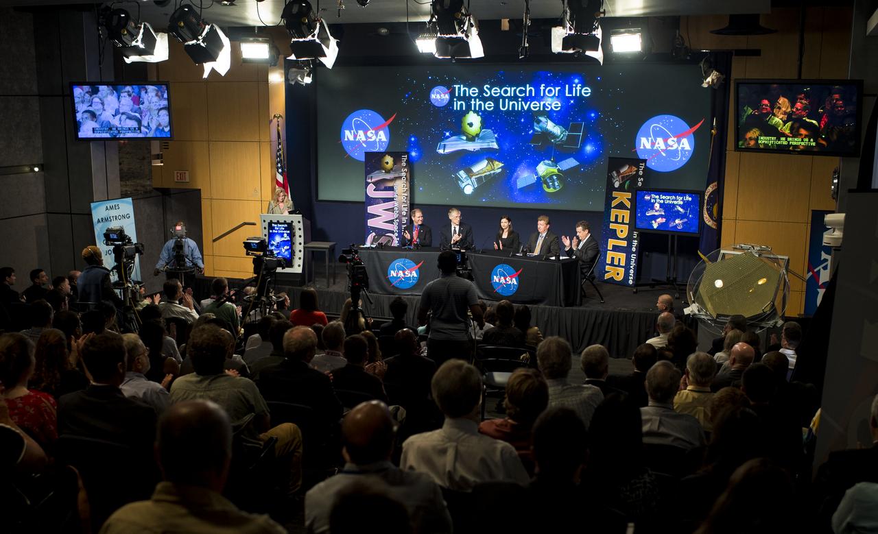NASA Chief Scientist Ellen Stofan, far left, introduces members of the panel prior to a discussion of the search for life beyond Earth in the James E. Webb Auditorium at NASA Headquarters on Monday, July 14, 2014 in Washington, DC. The panel discussed how NASA's space-based observatories are making new discoveries and how the agency's new telescope, the James Webb Space Telescope, will continue this path of discovery after its schedule launch in 2018.   Photo Credit: (NASA/Joel Kowsky)