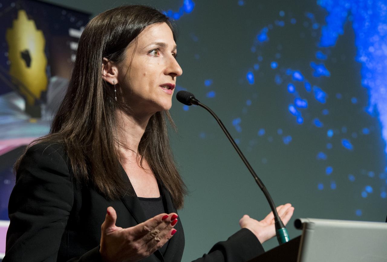Sara Seager, a MacArthur Fellow and Professor of Planetary Science and Physics at the Massachusetts Institute of Technology, speaks during a panel discussion on the search for life beyond Earth in the James E. Webb Auditorium at NASA Headquarters on Monday, July 14, 2014 in Washington, DC. The panel discussed how NASA's space-based observatories are making new discoveries and how the agency's new telescope, the James Webb Space Telescope, will continue this path of discovery after its schedule launch in 2018.   Photo Credit: (NASA/Joel Kowsky)