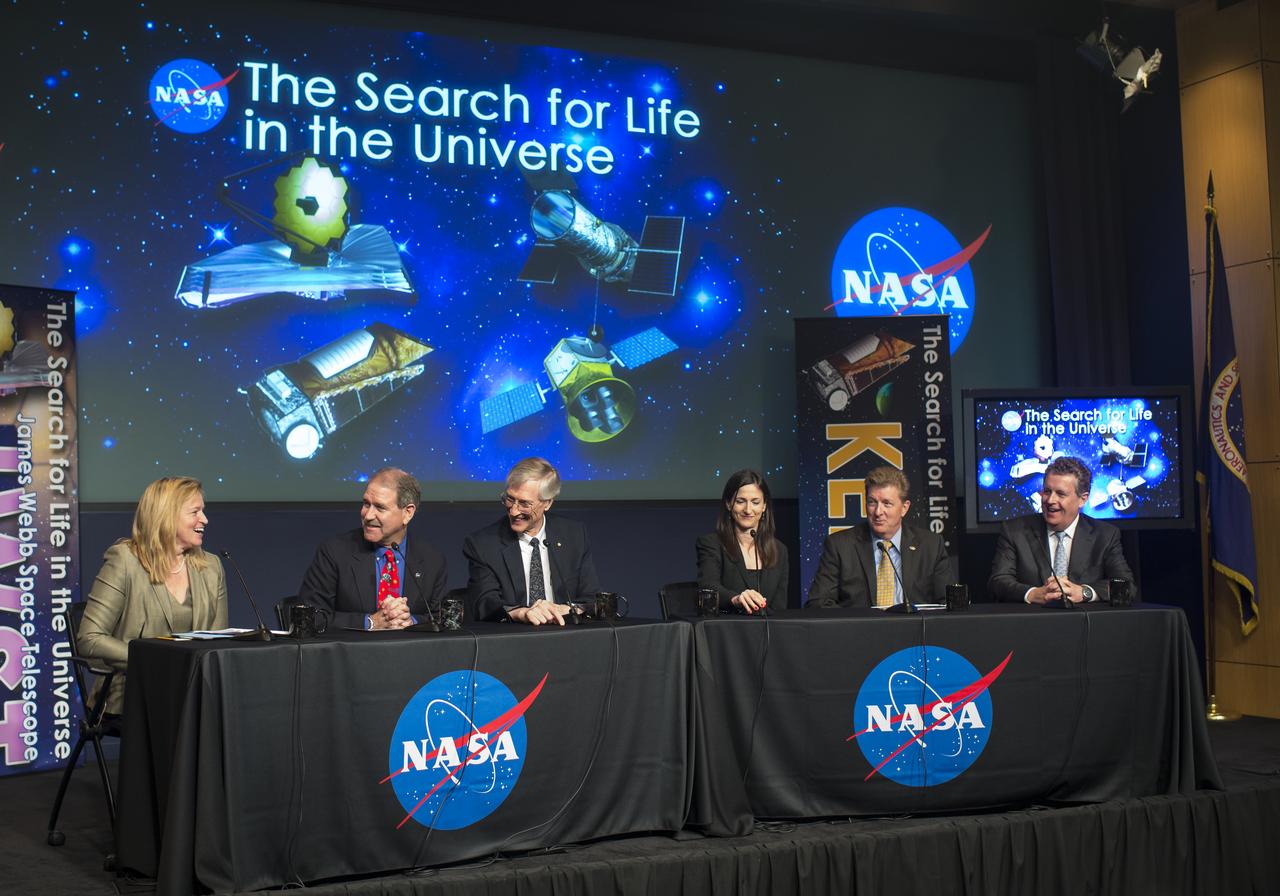 Panelists (from left) Ellen Stofan, NASA Chief Scientist, left; John Grunsfeld, Associate Administrator for NASA's Science Mission DIrectorate, second from left; John Mather, Nobel Laureate and Senior Project Scientist for the James Webb Space Telescope (JWST) at NASA's Goddard Space Flight Center, third from left; Sara Seager, MacArthur Fellow and Professor of Planetary Science and Physics at the Massachusetts Institute of Technology, third from right; Dave Gallagher, Director for Astronomy and Physics at NASA's Jet Propulsion Laboratory, second from right; and Matt Mountain, Director of the Space Telescope Science Institute and Telescope Scientist for the JWST, right; are seen during a panel discussion on the search for life beyond Earth in the James E. Webb Auditorium at NASA Headquarters on Monday, July 14, 2014 in Washington, DC. The panel discussed how NASA's space-based observatories are making new discoveries and how the agency's new telescope, the James Webb Space Telescope, will continue this path of discovery after its schedule launch in 2018.   Photo Credit: (NASA/Joel Kowsky)