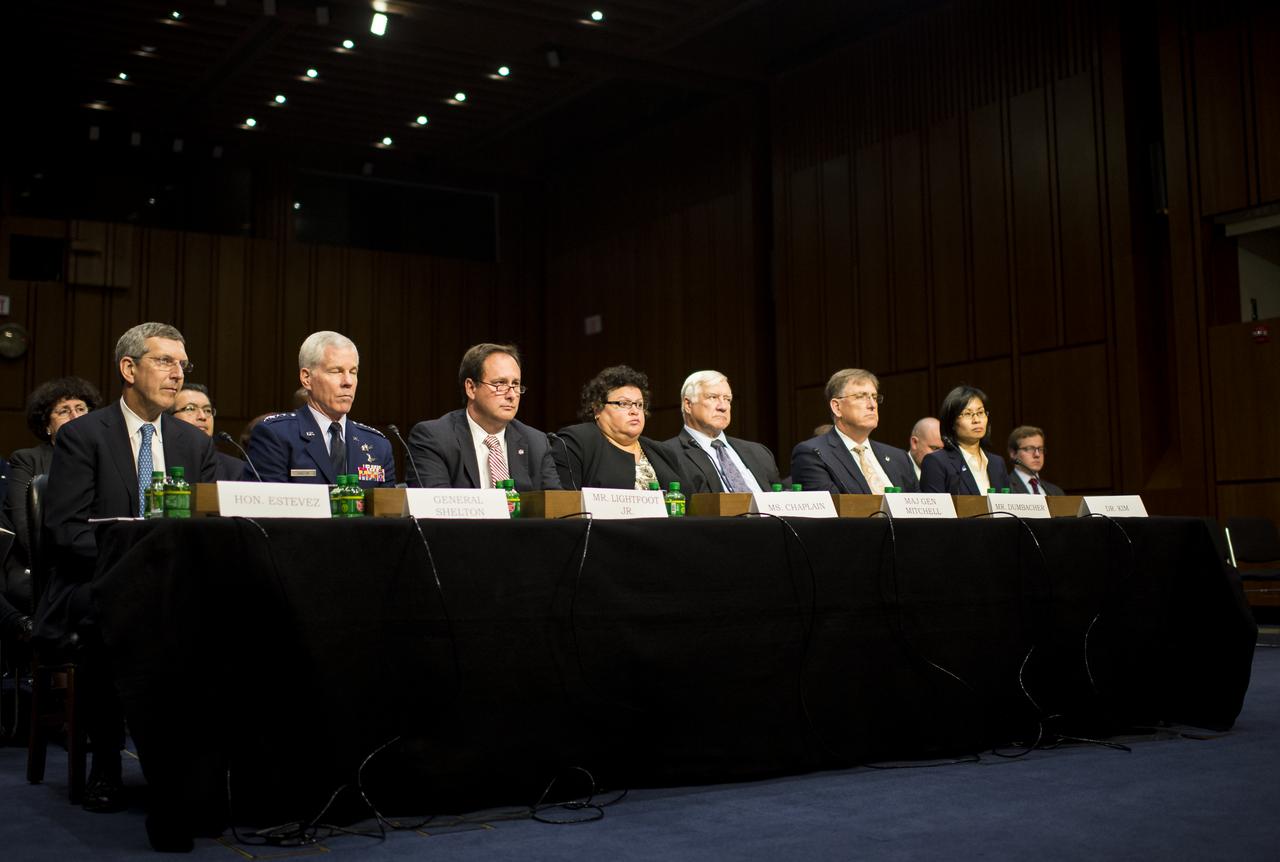 From left; Hon. Alan Estevez, Principle Deputy Under Secretary of Defense for Acquisition, Technology, and Logistics; General William Shelton, Commander of the United States Air Force Space Command; Robert Lightfoot, NASA Associate Administrator; Cristina Chaplain, Director of Acquisition and Sourcing Management at the Government Accountability Office; major General Howard Mitchell (USAF Ret.), Vice President for Program Assessments at The Aerospace Corporation; Daniel Dunbacher, Professor of Practice in the Department of Aeronautics and Aerospace Engineering at Purdue University; and Dr. Yool Kim, Senior Engineer at The Rand Corporation; are seen during a hearing in front of the Senate Subcommittee on Strategic Forces and Senate Committee on Commerce, Science, and Transportation on Wednesday, July 16, 2014, at the Hart Senate Office Building in Washington, DC. The Senate hearing focused on assured access to space.