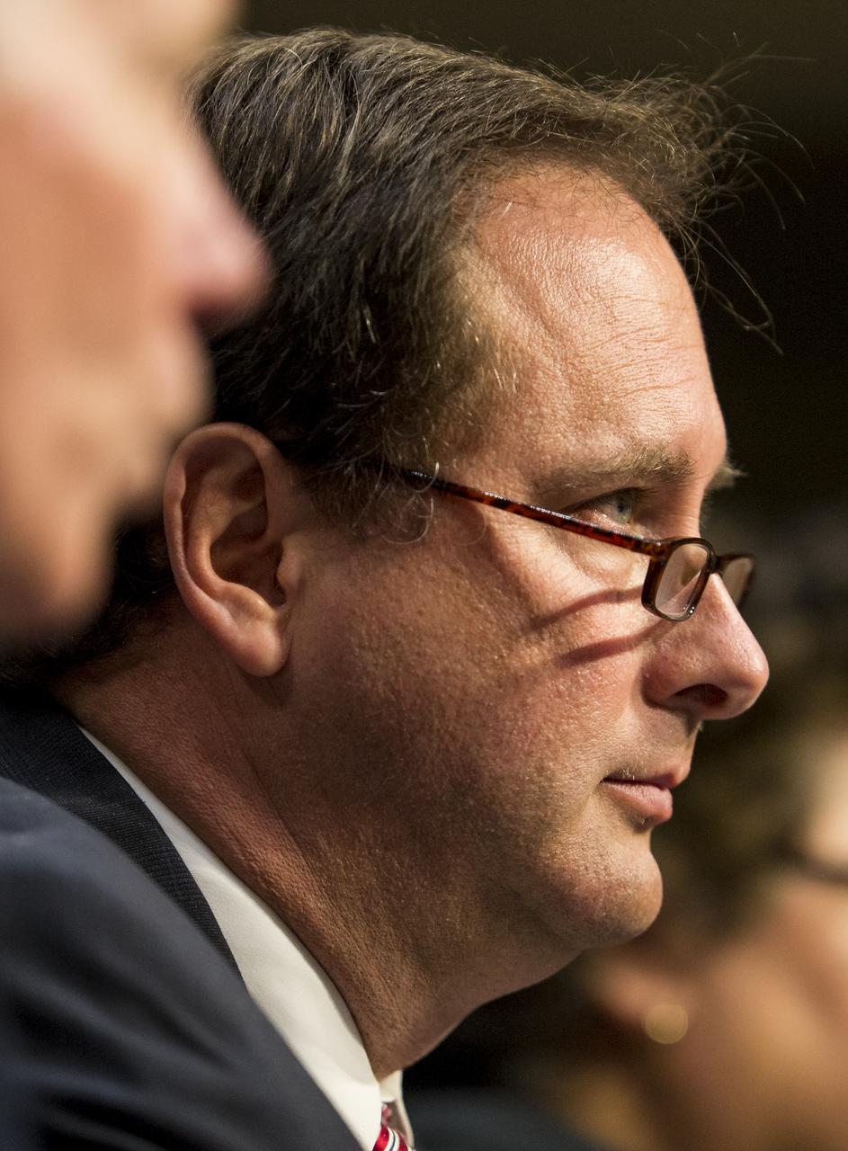 Robert Lightfoot, NASA Associate Administrator, answers a question during testimony in front of the Senate Subcommittee on Strategic Forces and Senate Committee on Commerce, Science, and Transportation on Wednesday, July 16, 2014, at the Hart Senate Office Building in Washington, DC. The Senate hearing focused on assured access to space.