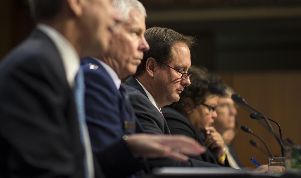 Robert Lightfoot, NASA Associate Administrator, answers a question during testimony in front of the Senate Subcommittee on Strategic Forces and Senate Committee on Commerce, Science, and Transportation on Wednesday, July 16, 2014, at the Hart Senate Office Building in Washington, DC. The Senate hearing focused on assured access to space.
