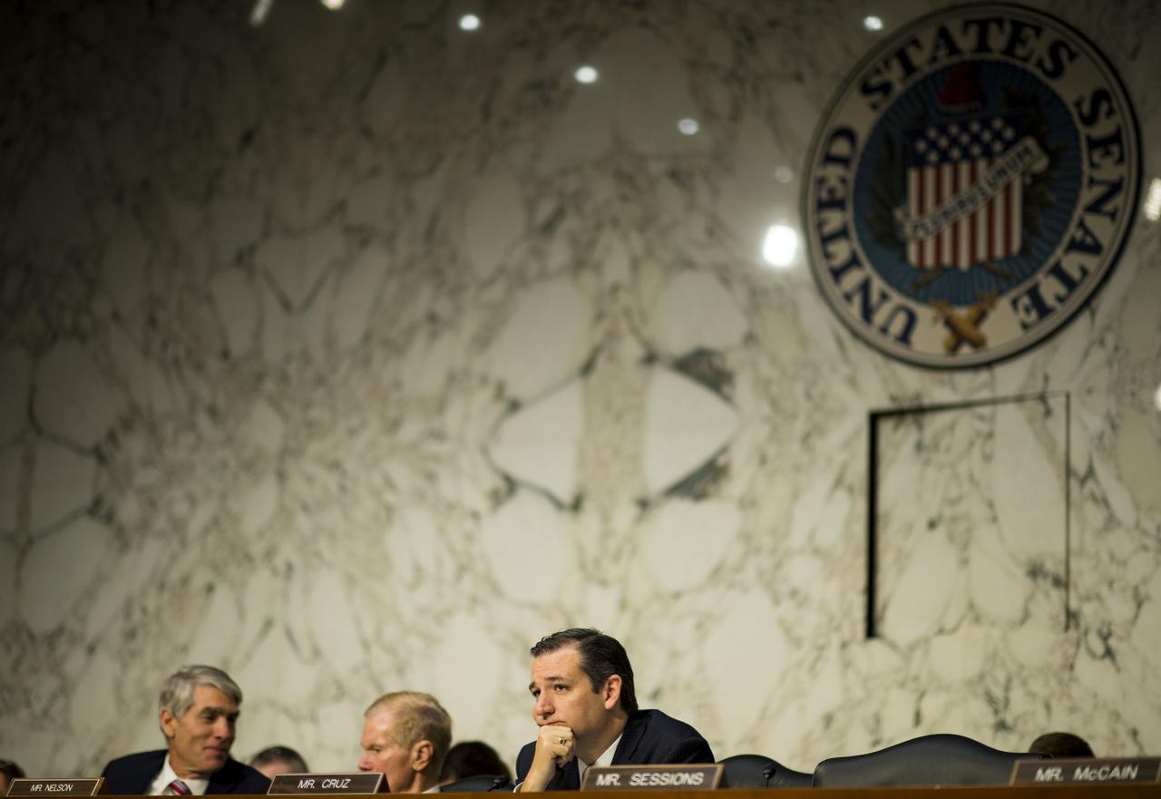 Sen. Ted Cruz, R-Texas, listens during testimony in front of the Senate Subcommittee on Strategic Forces and Senate Committee on Commerce, Science, and Transportation on Wednesday, July 16, 2014, at the Hart Senate Office Building in Washington, DC. The Senate hearing focused on assured access to space.