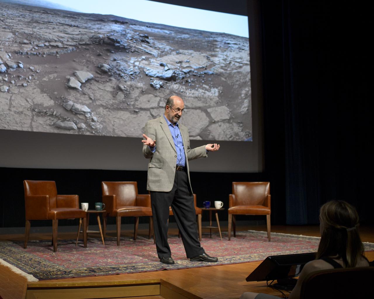 Marc Kaufman, space news writer, National Geographic and The Washington Post, and author of the new National Geographic book “Mars Up Close”, kicks off a panel discussion of Mars experts involved in current Mars exploration, Tuesday, August 5, 2014, at the National Geographic Society headquarters in Washington. The panelist shared what we’ve learned from Curiosity and the other Mars rovers surveying the red planet.  Photo Credit: (NASA/Bill Ingalls)