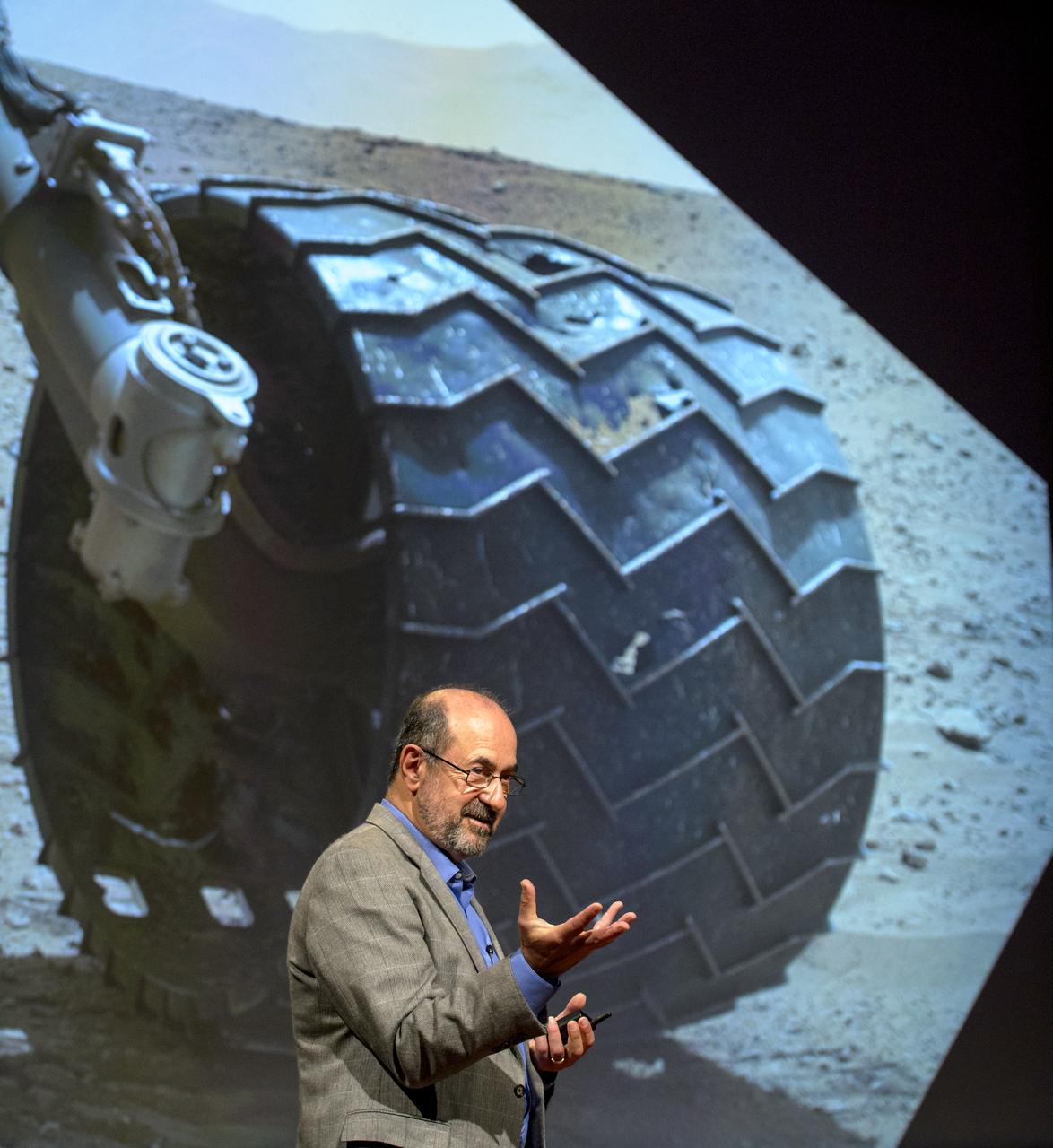 Marc Kaufman, space news writer, National Geographic and The Washington Post, and author of the new National Geographic book “Mars Up Close”, kicks off a panel discussion of Mars experts involved in current Mars exploration, Tuesday, August 5, 2014, at the National Geographic Society headquarters in Washington. The panelist shared what we’ve learned from Curiosity and the other Mars rovers surveying the red planet.  Photo Credit: (NASA/Bill Ingalls)