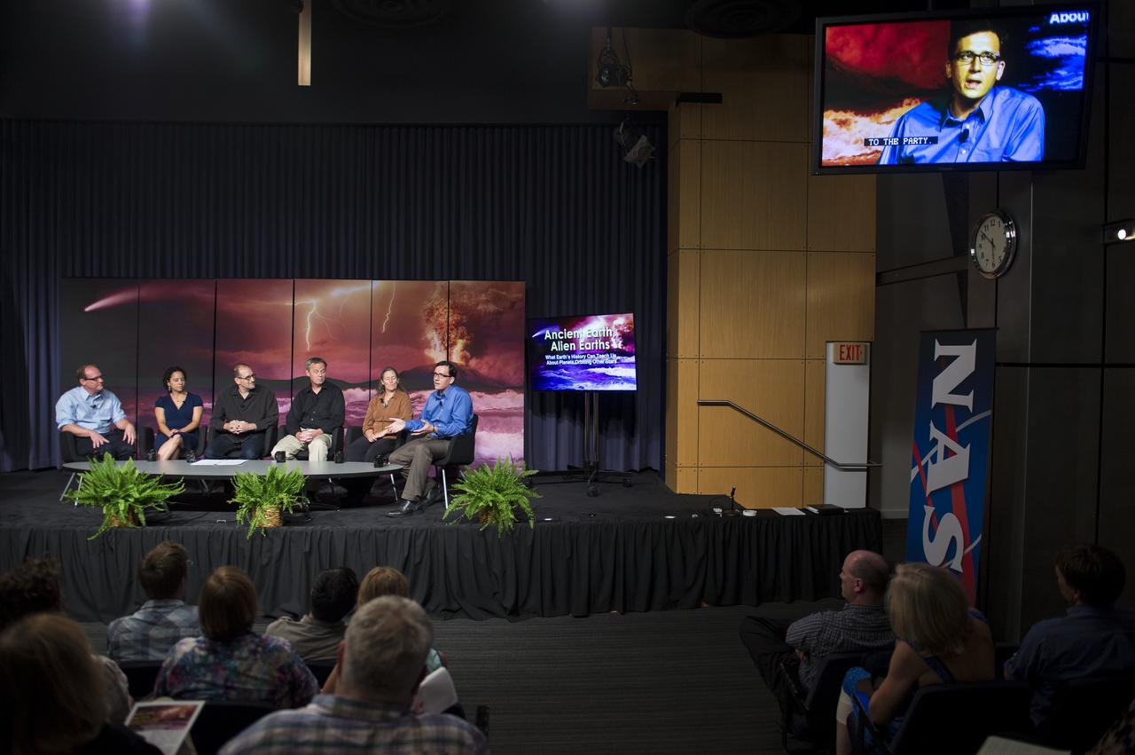 Dr. Shawn Domagal-Goldman, Research Space Scientist, NASA Goddard Space Flight Center, speaks on a panel at the “Ancient Earth, Alien Earths” Event at NASA Headquarters in Washington, DC Wednesday, August 20, 2014. The event was sponsored by NASA, the National Science Foundation (NSF), and the Smithsonian Institution and was moderated by Dr. David H. Grinspoon, Senior Scientist at the Planetary Science Institute. Six scientists discussed how research on early Earth could help guide our search for habitable planets orbiting other stars. Photo Credit: (NASA/Aubrey Gemignani)
