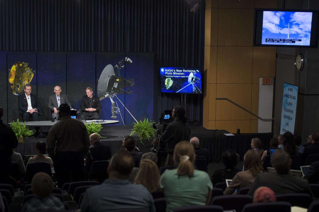 Dr. Jim Green, Dr. Ed Stone, and Dr. Alan Stern speak on a panel at the "New Horizons: The First Mission to the Pluto System and the Kuiper Belt" Event at NASA Headquarters in Washington, DC Monday, August 25, 2014. They discussed how the first images of Pluto and its moons would be captured by the New Horizons spacecraft during a five month long reconnaissance flyby study starting in the summer of 2015.  New Horizons launched on January 19, 2006 and is scheduled to make its closest approach to Pluto on July 14, 2015. Photo Credit: (NASA/Aubrey Gemignani)