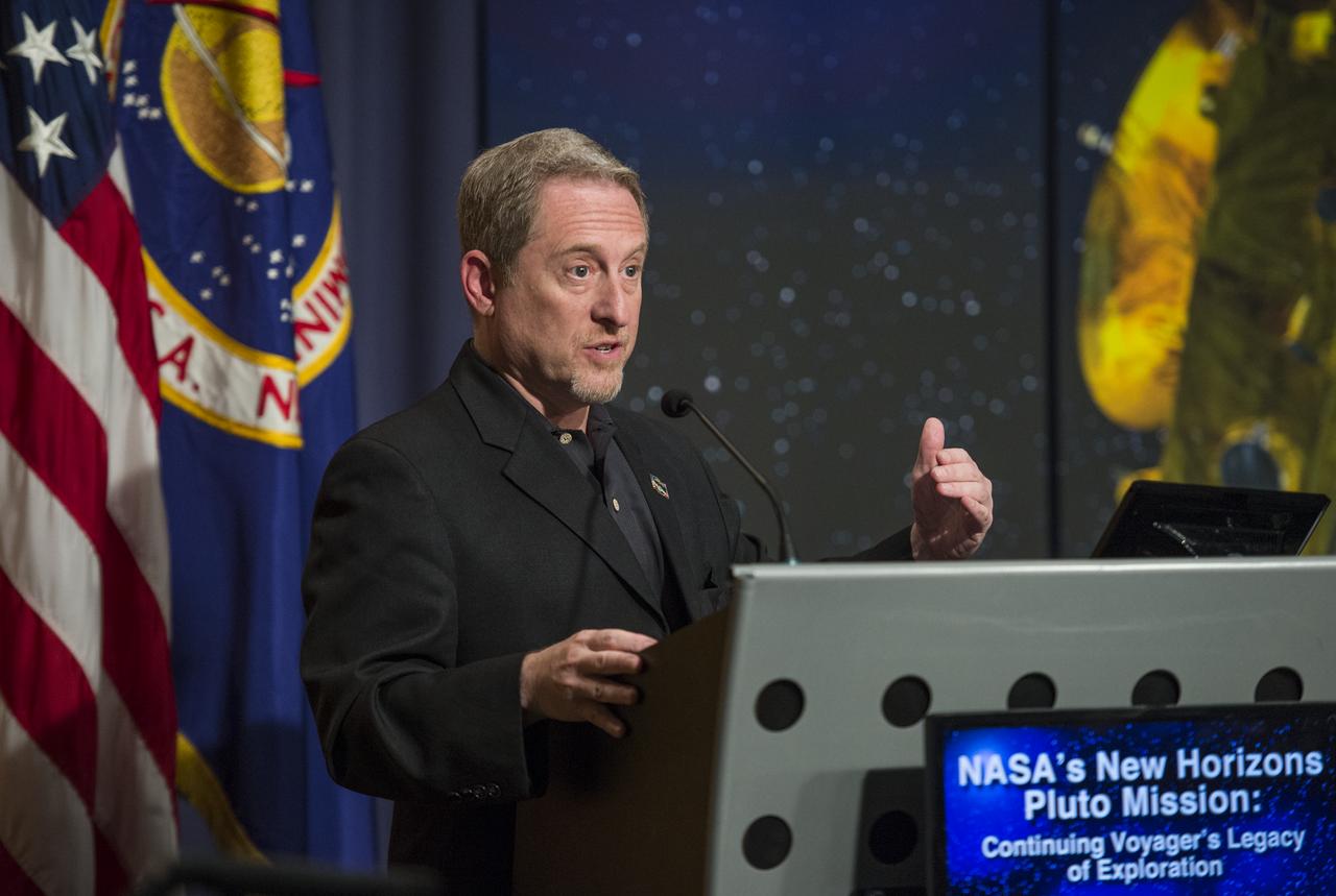 Dr. Alan Stern, Principal Investigator on NASA's New Horizons Mission, delivers closing remarks following a panel discussion at the "NASA's New Horizons Pluto Mission: Continuing Voyager's Legacy of Exploration" event on Monday, August, 25, 2014, in the James E. Webb Auditorium at NASA Headquarters in Washington, DC.  The panelists gave their accounts of Voyager's encounter with Neptune and discussed their current assignments on NASA's New Horizons mission to Pluto.  Photo Credit: (NASA/Joel Kowsky)