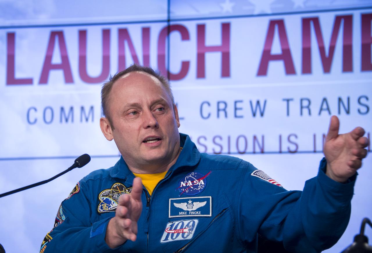 Astronaut Mike Fincke, a former commander of the International Space Station, speaks during a news conference where it was announced that Boeing and SpaceX have been selected to transport U.S. crews to and from the International Space Station using the Boeing CST-100 and the SpaceX Crew Dragon spacecraft, at NASA’s Kennedy Space Center in Cape Canaveral, Fla. on Tuesday, Sept. 16, 2014. These Commercial Crew Transportation Capability (CCtCap) contracts are designed to complete the NASA certification for a human space transportation system capable of carrying people into orbit. Once certification is complete, NASA plans to use these systems to transport astronauts to the space station and return them safely to Earth.  Photo Credit: (NASA/Bill Ingalls)